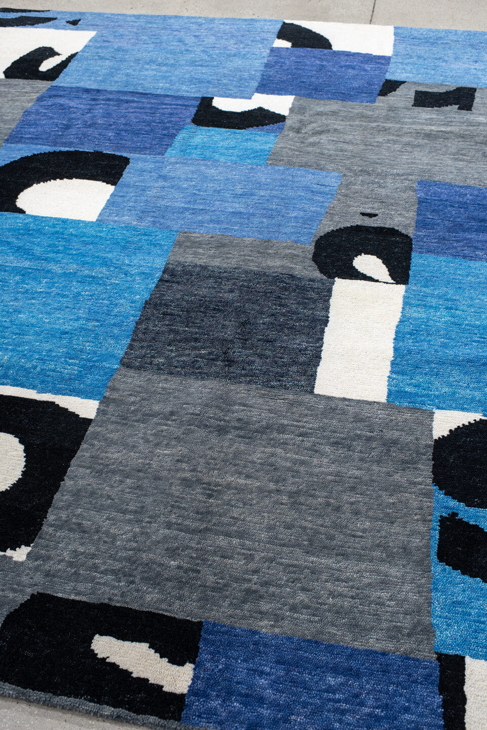 8' x 10' one-of-a-kind handmade vintage Tribeca large size rug. Color palette: blue, gray, ivory, navy, black, sky_blue
