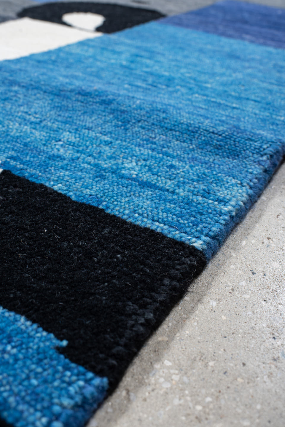 8' x 10' one-of-a-kind handmade vintage Tribeca large size rug. Color palette: blue, gray, ivory, navy, black, sky_blue