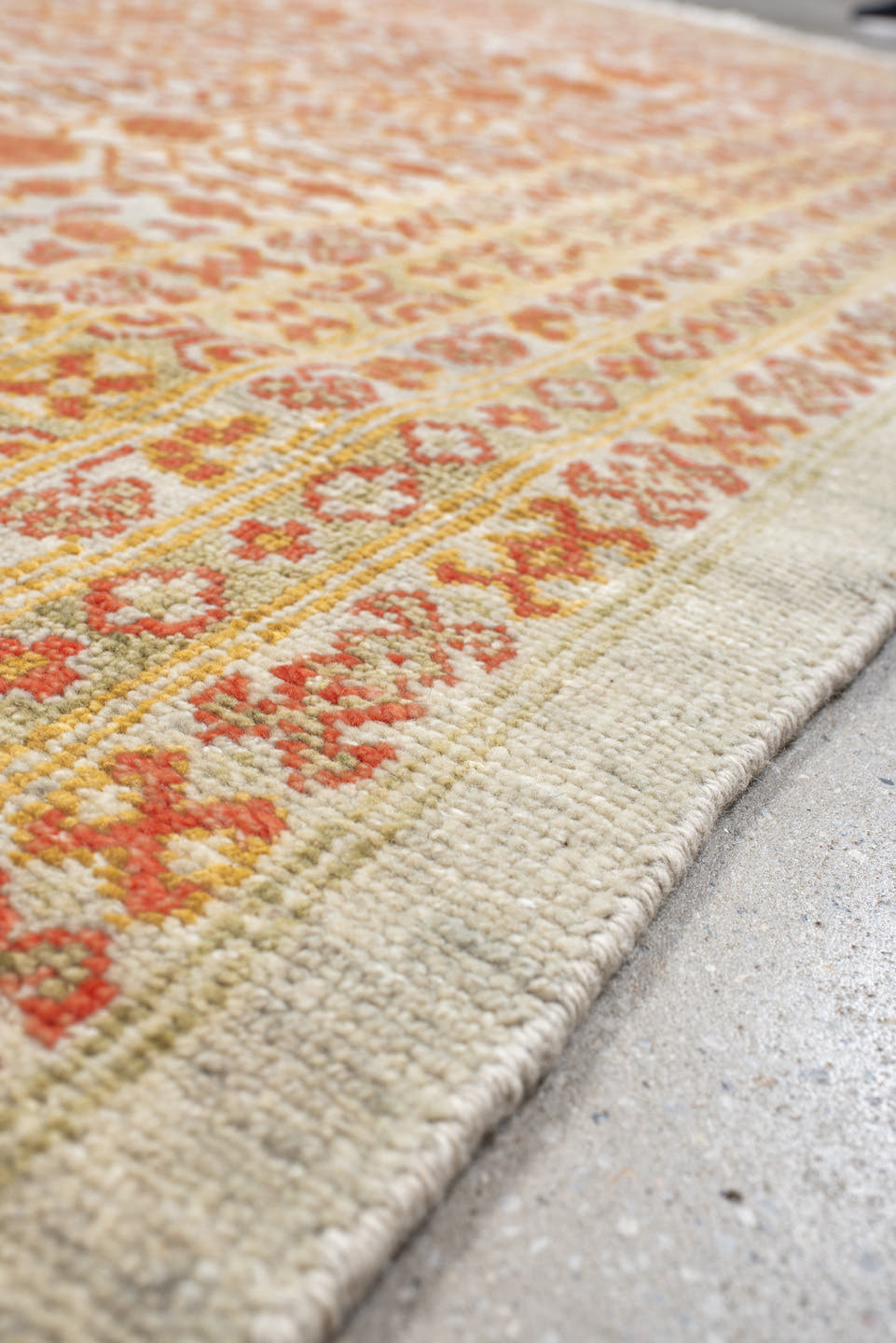 7' x 9' one-of-a-kind handmade vintage Tribeca large size rug. Color palette: ivory, terra cotta, sage, camel, rust