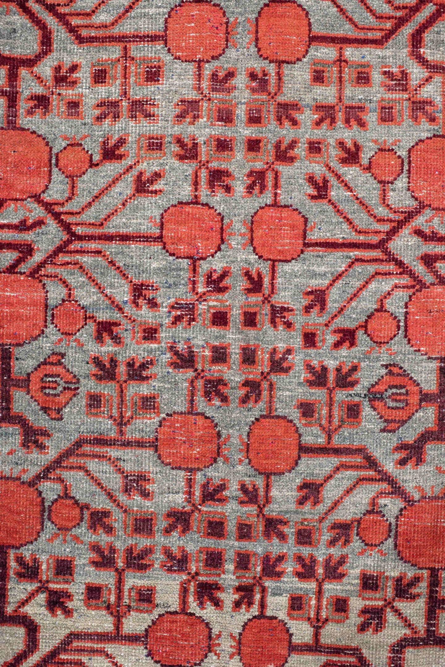 5' x 11' one-of-a-kind handmade vintage Khotan rug. Color palette: coral, ivory, slate, burgundy, rose, charcoal, terracotta