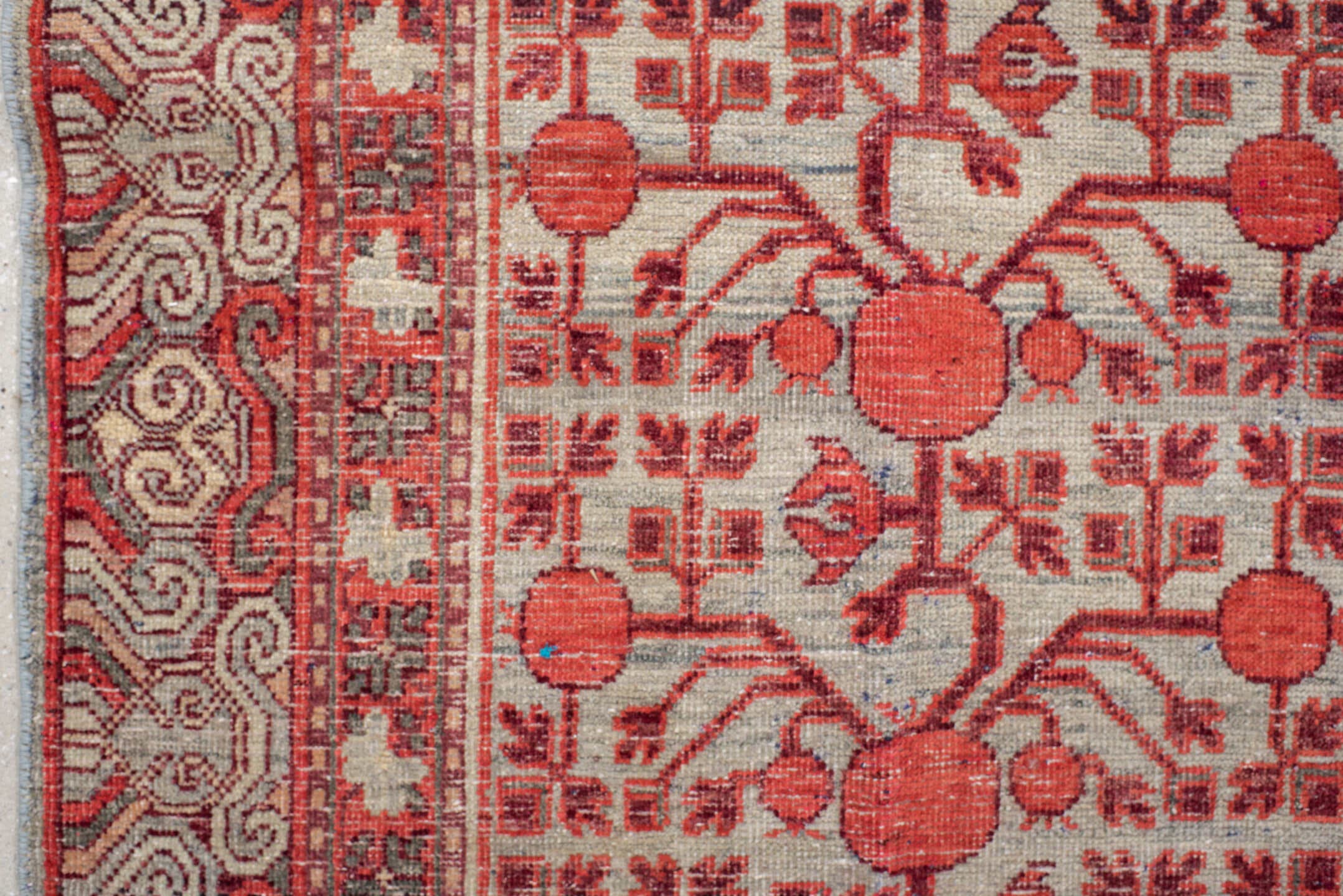 5' x 11' one-of-a-kind handmade vintage Khotan rug. Color palette: coral, ivory, slate, burgundy, rose, charcoal, terracotta