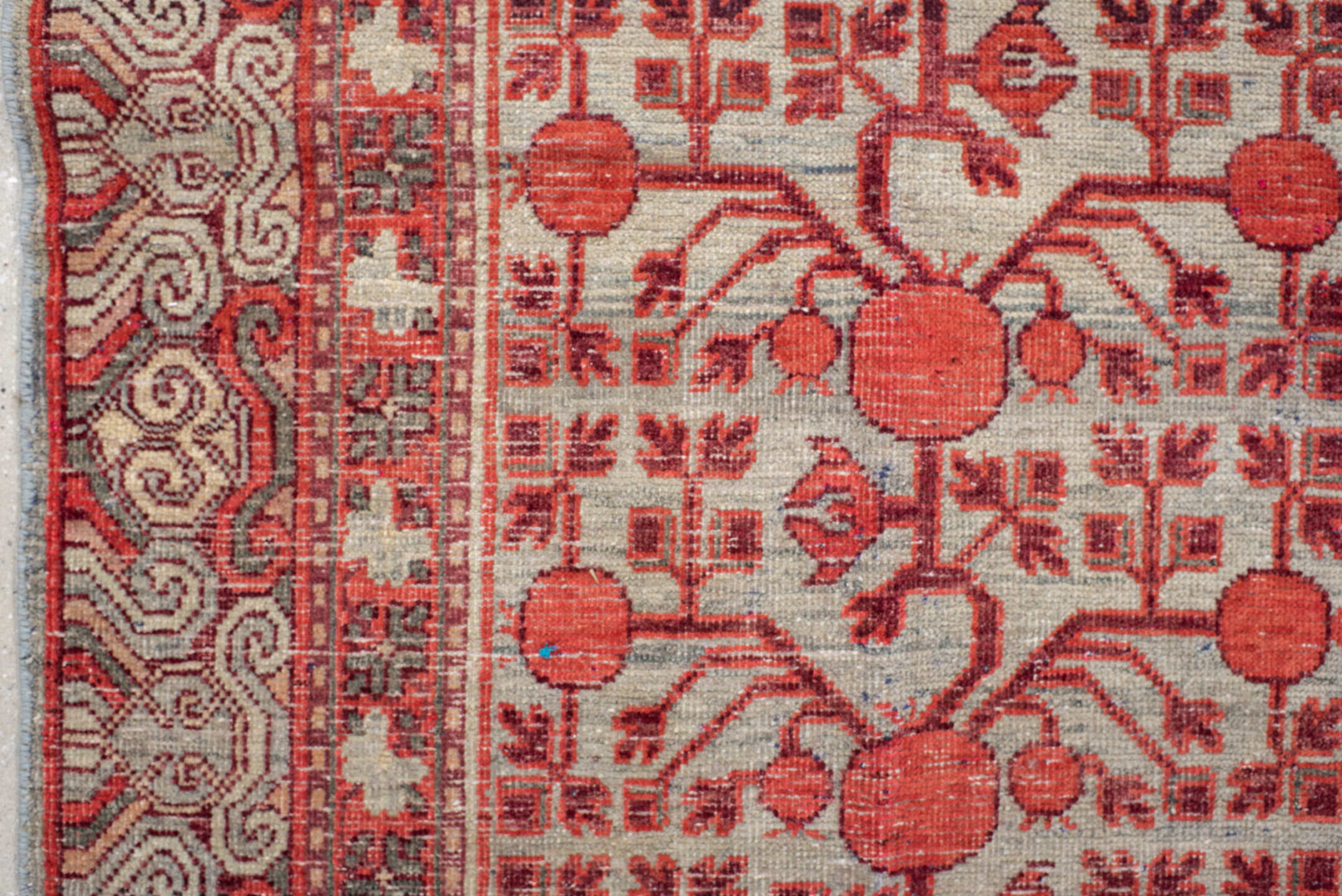 5' x 11' one-of-a-kind handmade vintage Khotan rug. Color palette: coral, ivory, slate, burgundy, rose, charcoal, terracotta