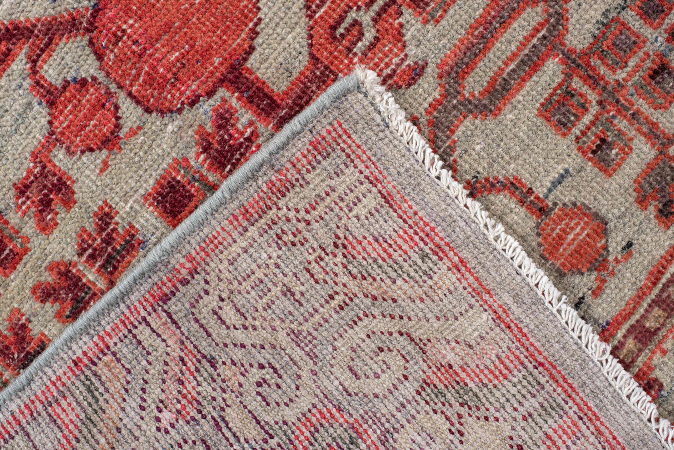 5' x 11' one-of-a-kind handmade vintage Khotan rug. Color palette: coral, ivory, slate, burgundy, rose, charcoal, terracotta