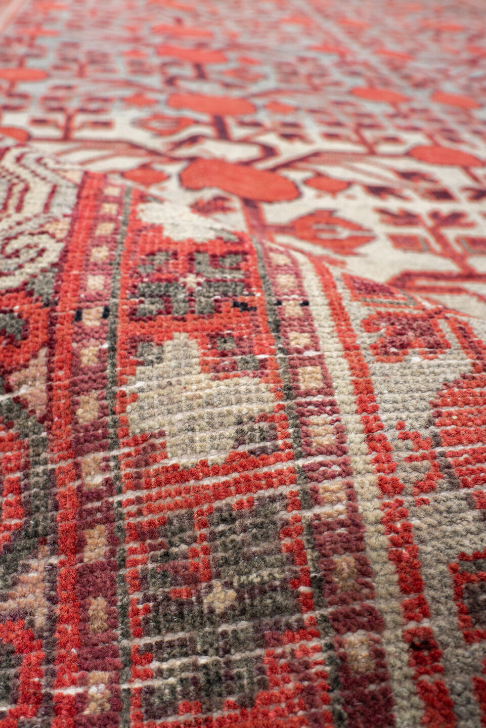 5' x 11' one-of-a-kind handmade vintage Khotan rug. Color palette: coral, ivory, slate, burgundy, rose, charcoal, terracotta