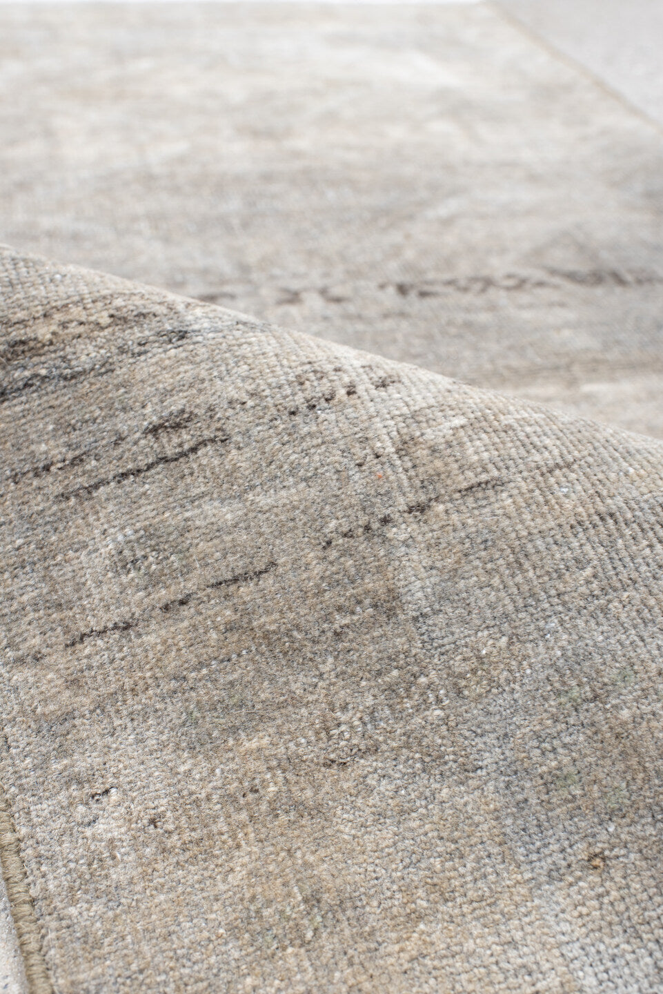 1' x 3' one-of-a-kind handmade antique Belouch small size rug. Color palette: ivory, taupe, beige, brown, gray