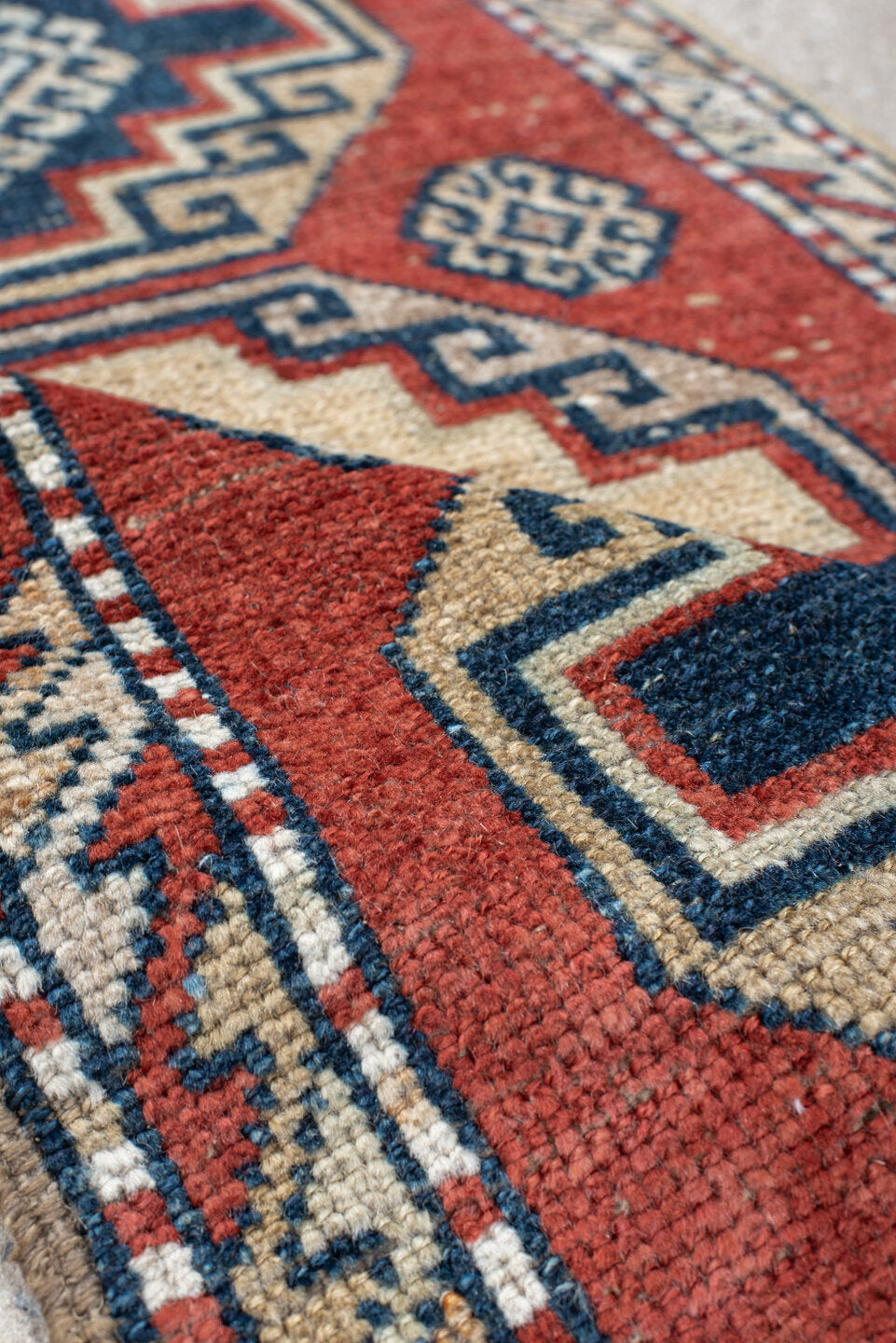 2' x 3' one-of-a-kind handmade vintage Anatolian small size rug. Color palette: rust, ivory, navy, crimson, terracotta