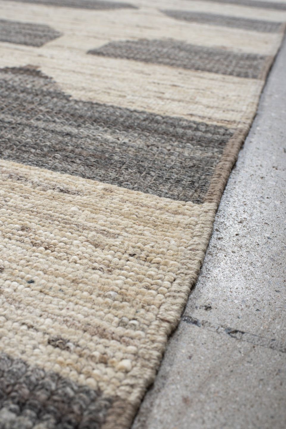 10' x 13' one-of-a-kind handmade vintage Tulu large size rug. Color palette: gray, off-white, light gray, dark gray