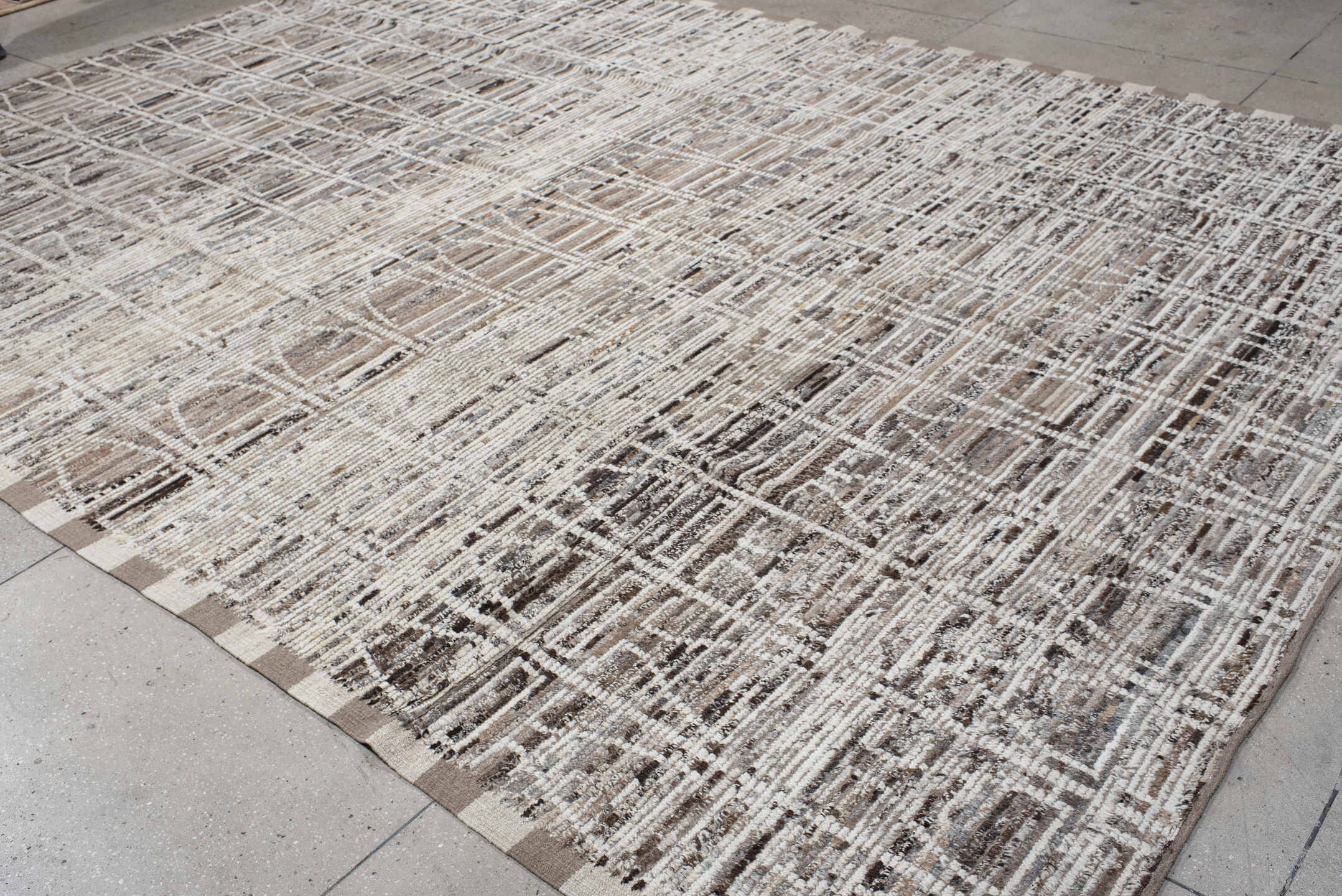 9' x 14' one-of-a-kind handmade vintage Tulu large size rug. Color palette: ivory, taupe, beige, brown, charcoal, gray