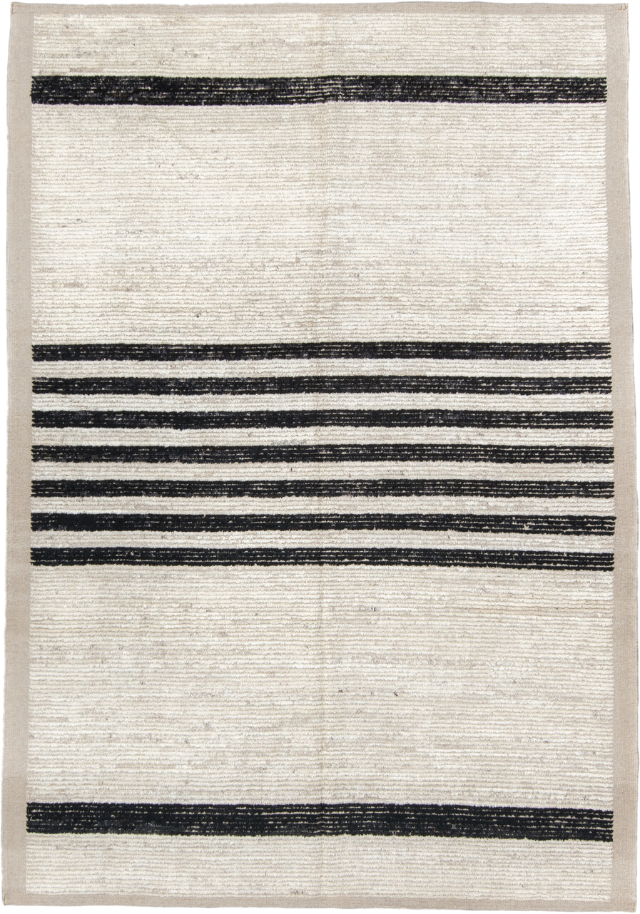 6' x 9' one-of-a-kind handmade vintage Tulu medium size rug. Color palette: ivory, charcoal, beige, gray, black