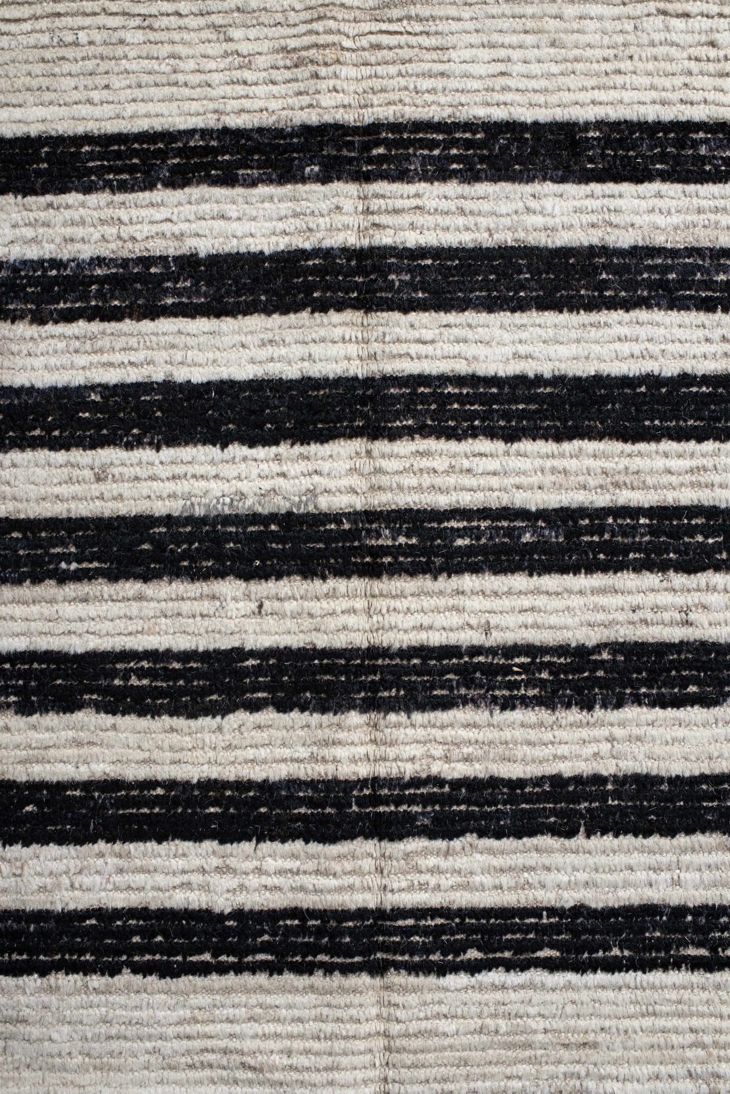 6' x 9' one-of-a-kind handmade vintage Tulu medium size rug. Color palette: ivory, charcoal, beige, gray, black