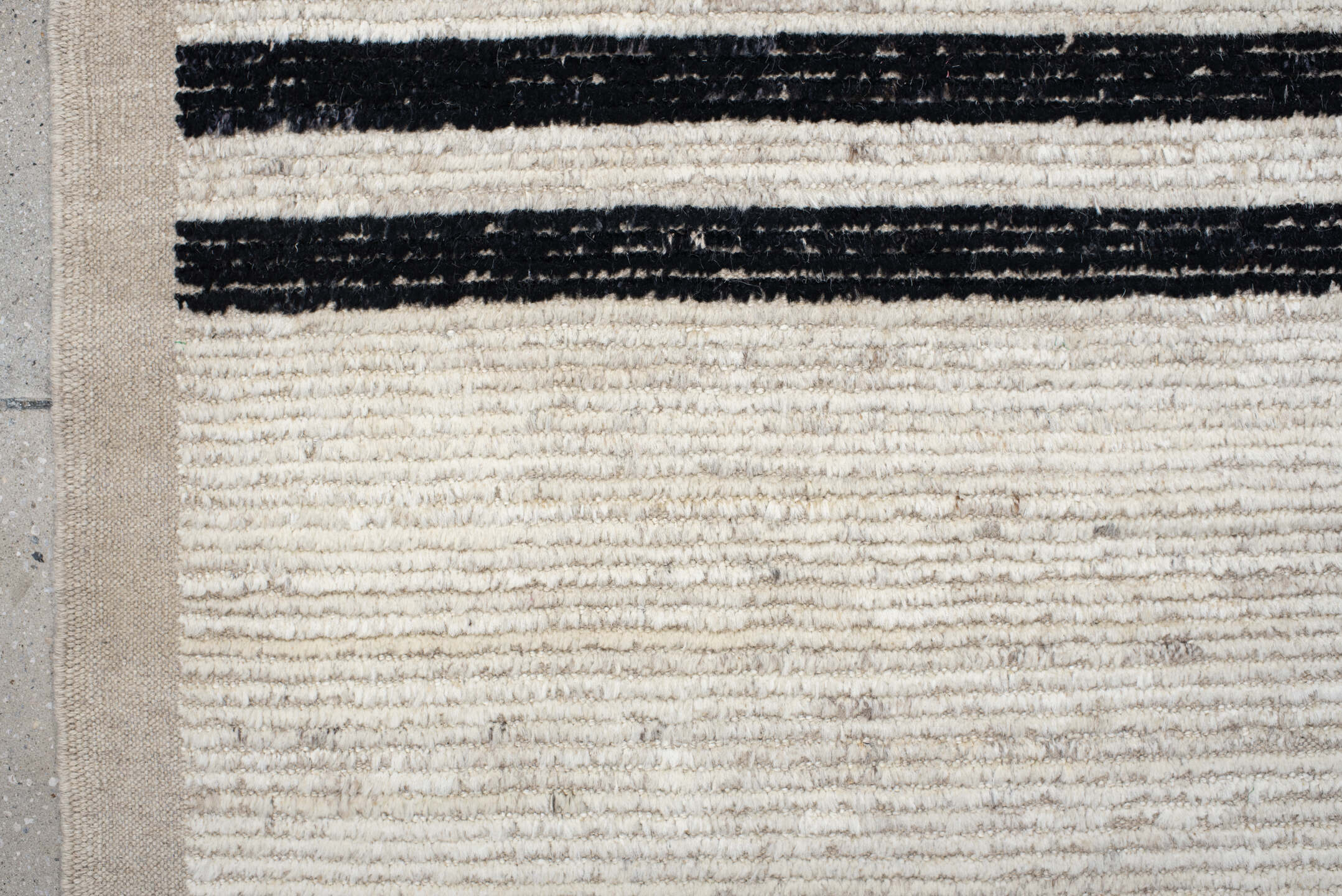 6' x 9' one-of-a-kind handmade vintage Tulu medium size rug. Color palette: ivory, charcoal, beige, gray, black