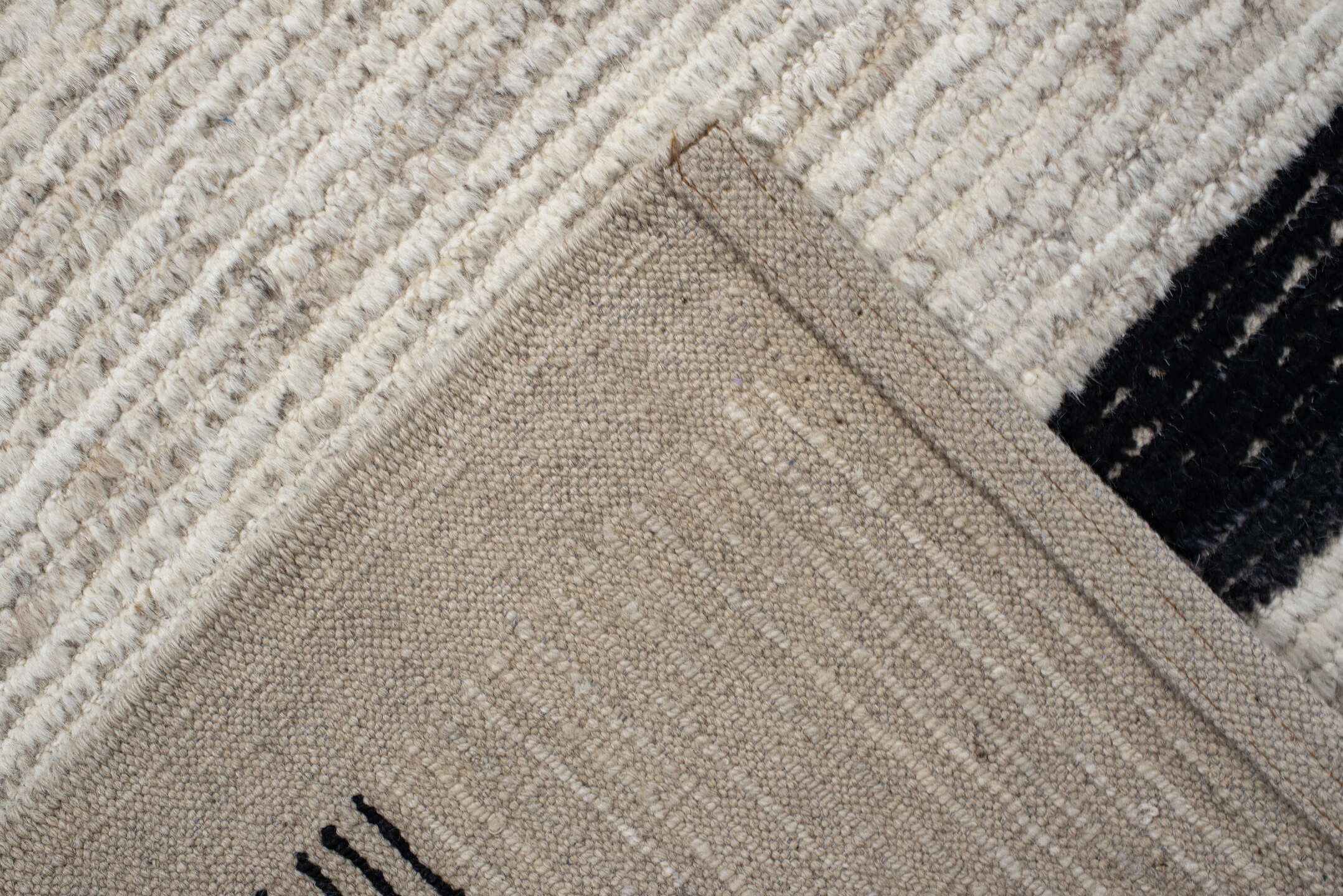 6' x 9' one-of-a-kind handmade vintage Tulu medium size rug. Color palette: ivory, charcoal, beige, gray, black