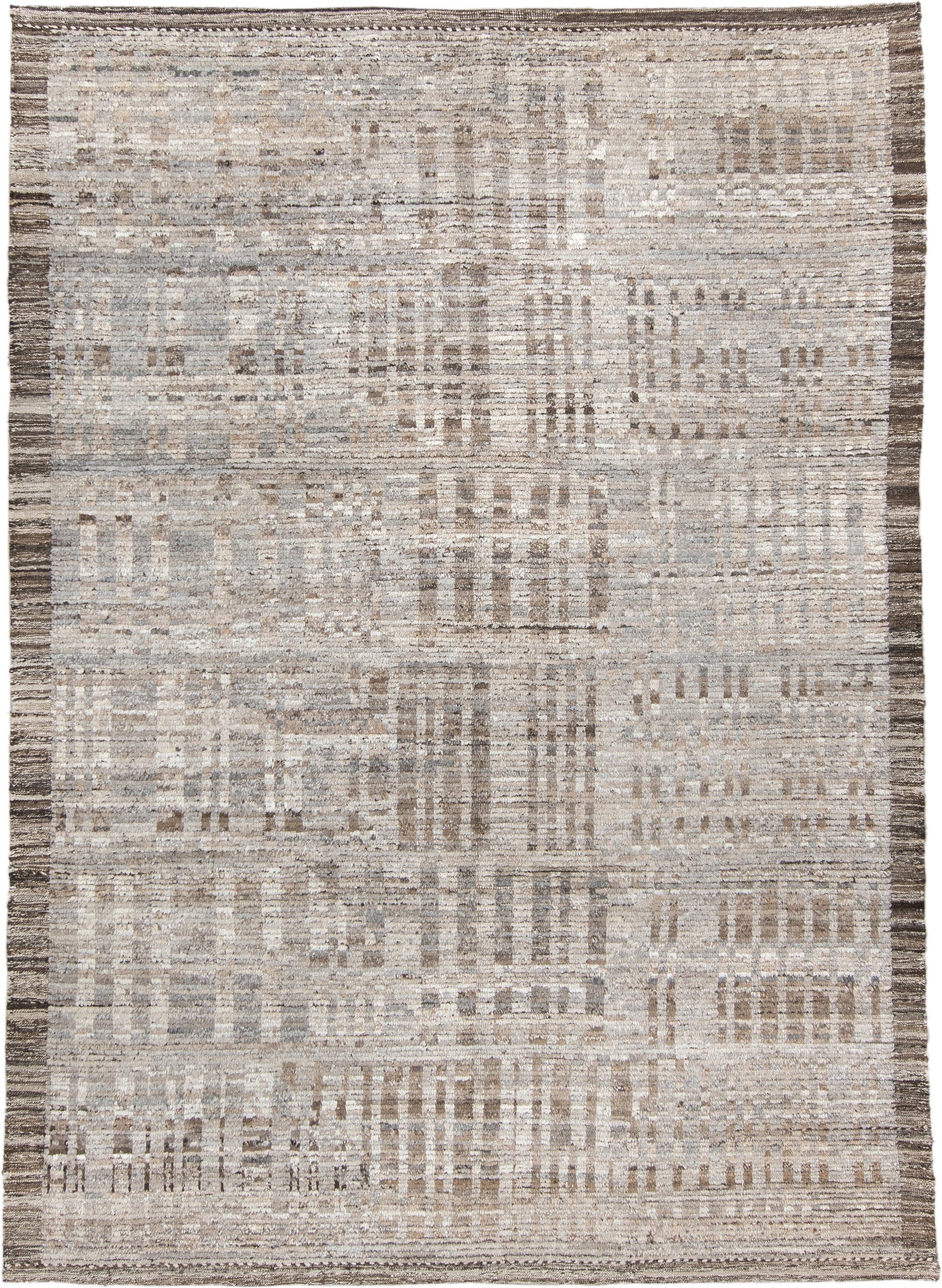 6' x 9' one-of-a-kind handmade vintage Tulu medium size rug. Color palette: ivory, taupe, beige, brown, gray, cream