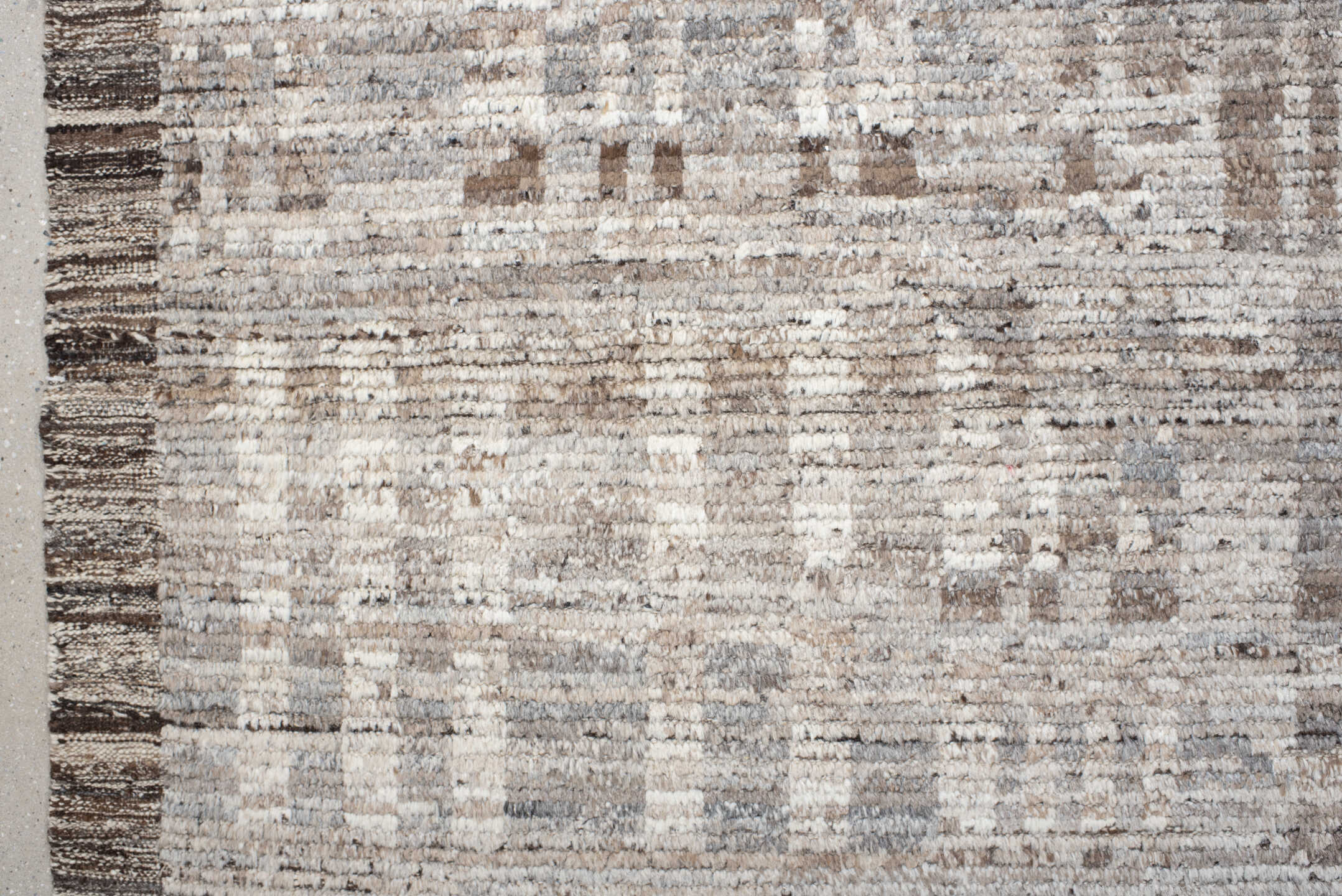 6' x 9' one-of-a-kind handmade vintage Tulu medium size rug. Color palette: ivory, taupe, beige, brown, gray, cream
