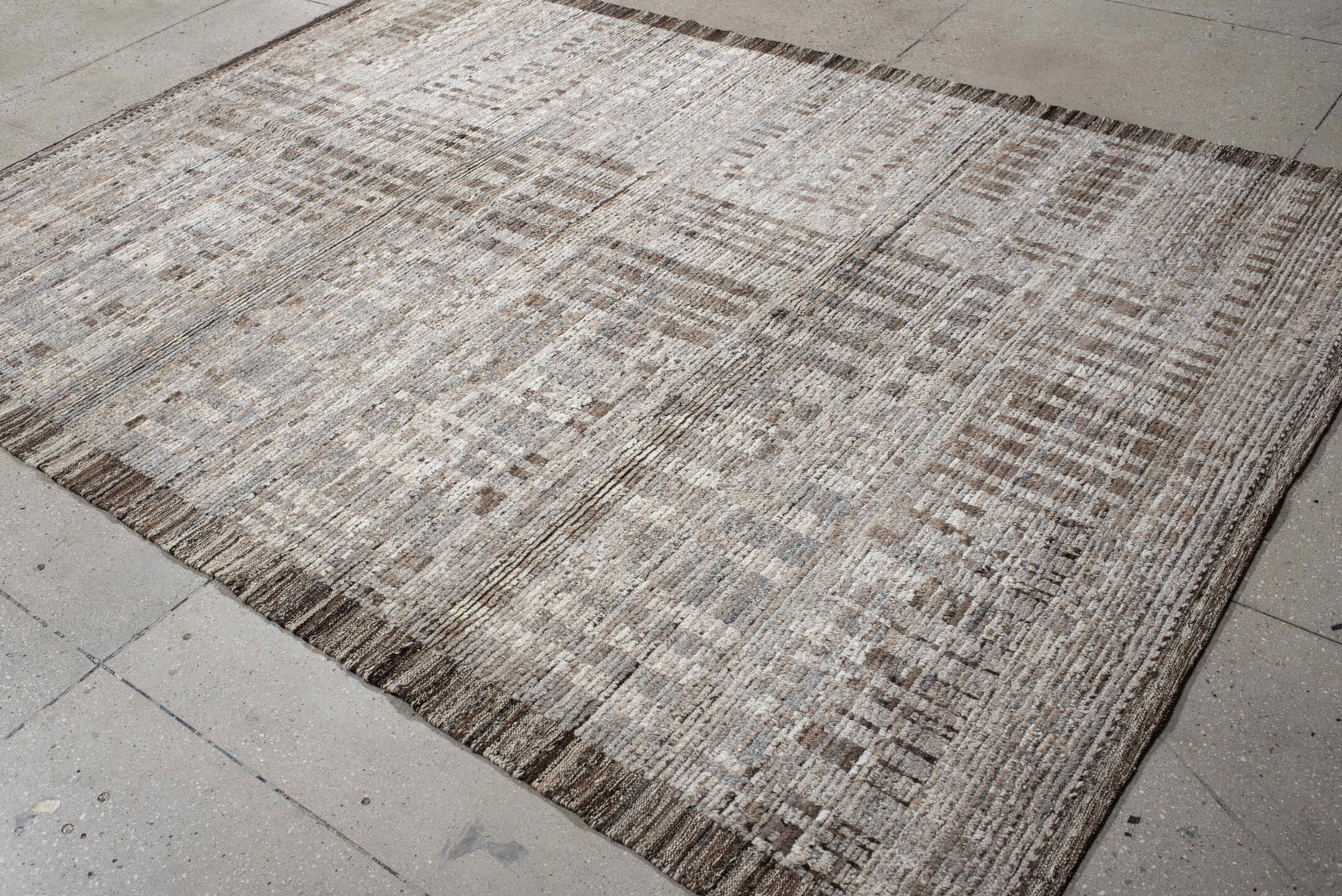 6' x 9' one-of-a-kind handmade vintage Tulu medium size rug. Color palette: ivory, taupe, beige, brown, gray, cream