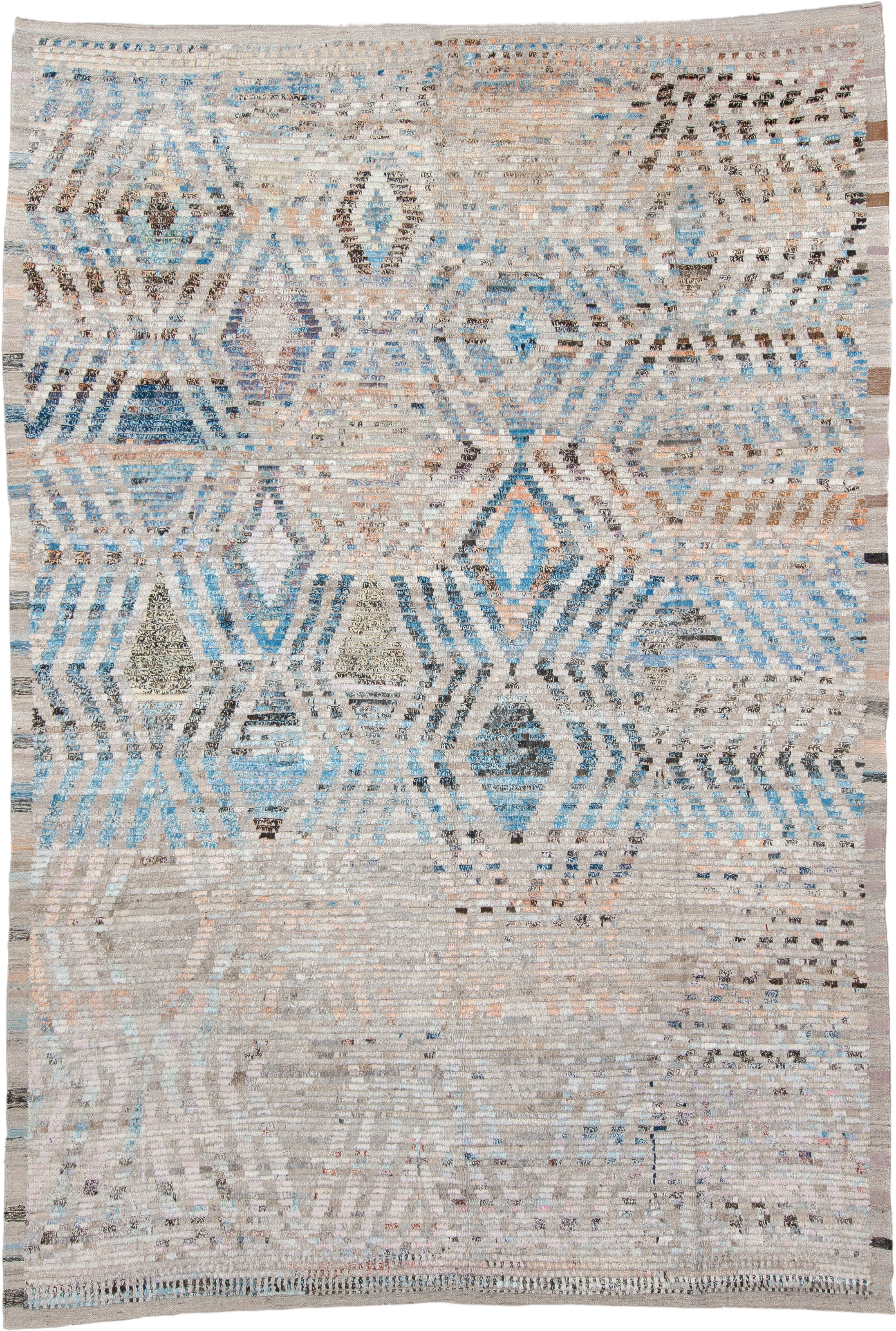 8' x 12' one-of-a-kind handmade vintage Tulu large size rug. Color palette: ivory, sky blue, taupe, charcoal, peach, gray