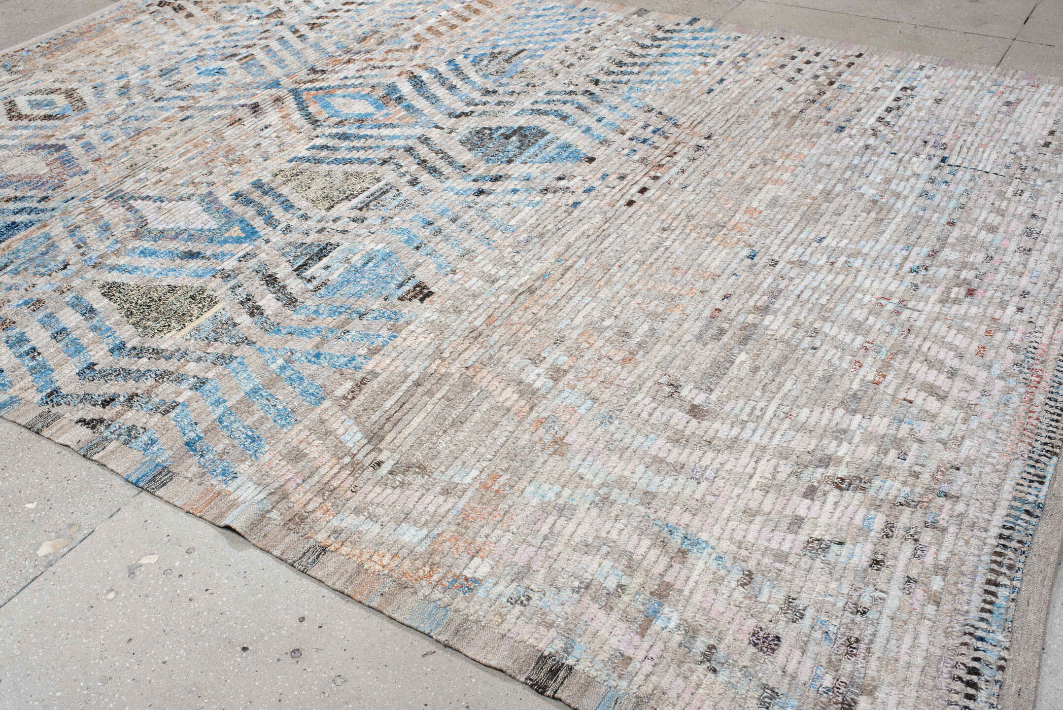 8' x 12' one-of-a-kind handmade vintage Tulu large size rug. Color palette: ivory, sky blue, taupe, charcoal, peach, gray