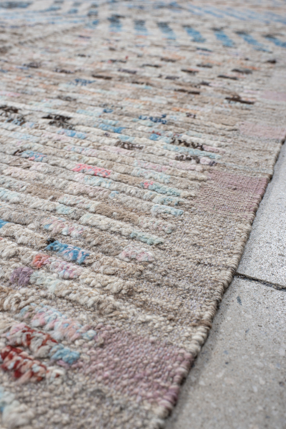 8' x 12' one-of-a-kind handmade vintage Tulu large size rug. Color palette: ivory, sky blue, taupe, charcoal, peach, gray