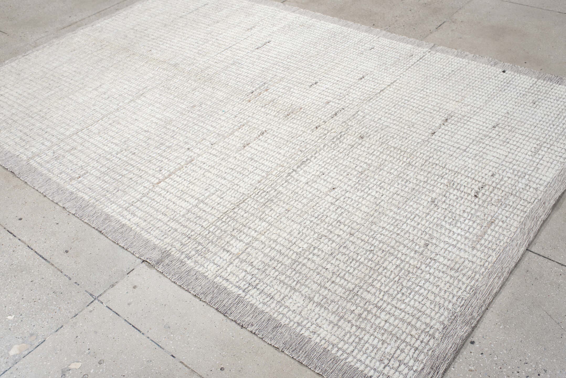 6' x 9' one-of-a-kind handmade vintage Tulu medium size rug. Color palette: ivory, gray, taupe, beige