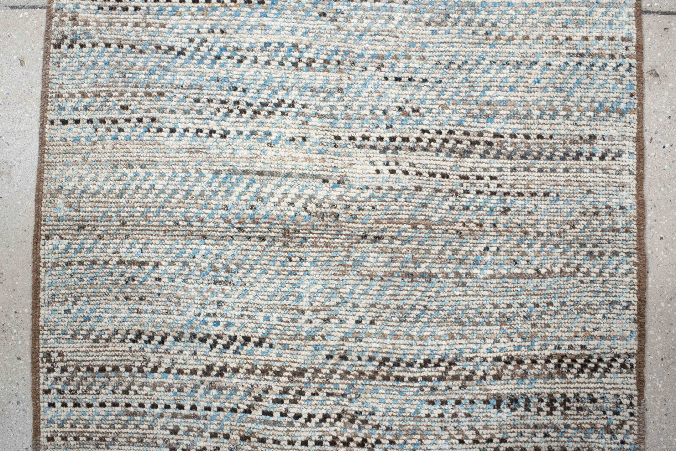 3' x 9' one-of-a-kind handmade vintage Tulu runner rug. Color palette: ivory, taupe, brown, pale_blue, charcoal, beige, gray