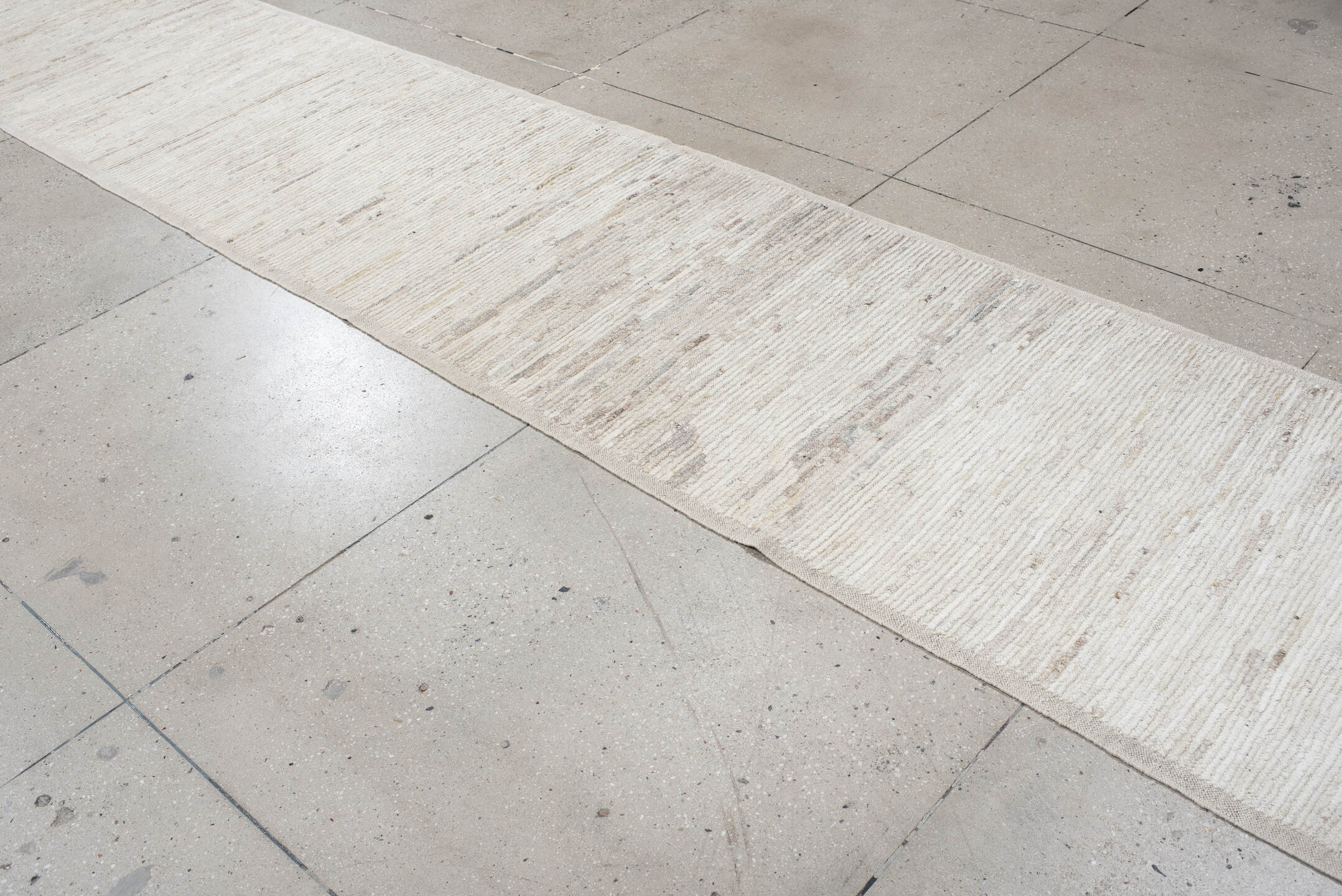 3' x 27' one-of-a-kind handmade vintage Tulu runner rug. Color palette: off-white, gray, light gray, pink, brown, white