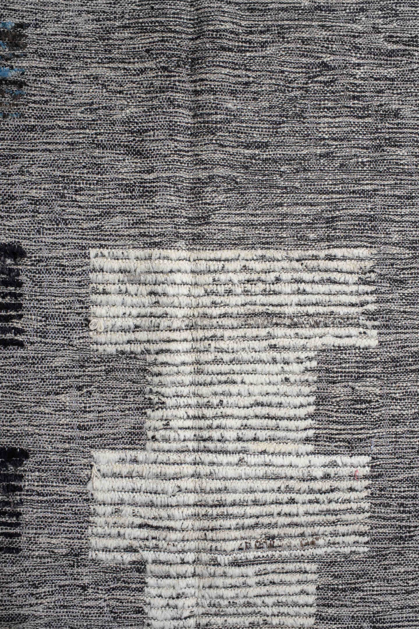7' x 9' one-of-a-kind handmade vintage Tulu rug. Color palette: gray, charcoal, ivory, turquoise, taupe, black, teal, beige