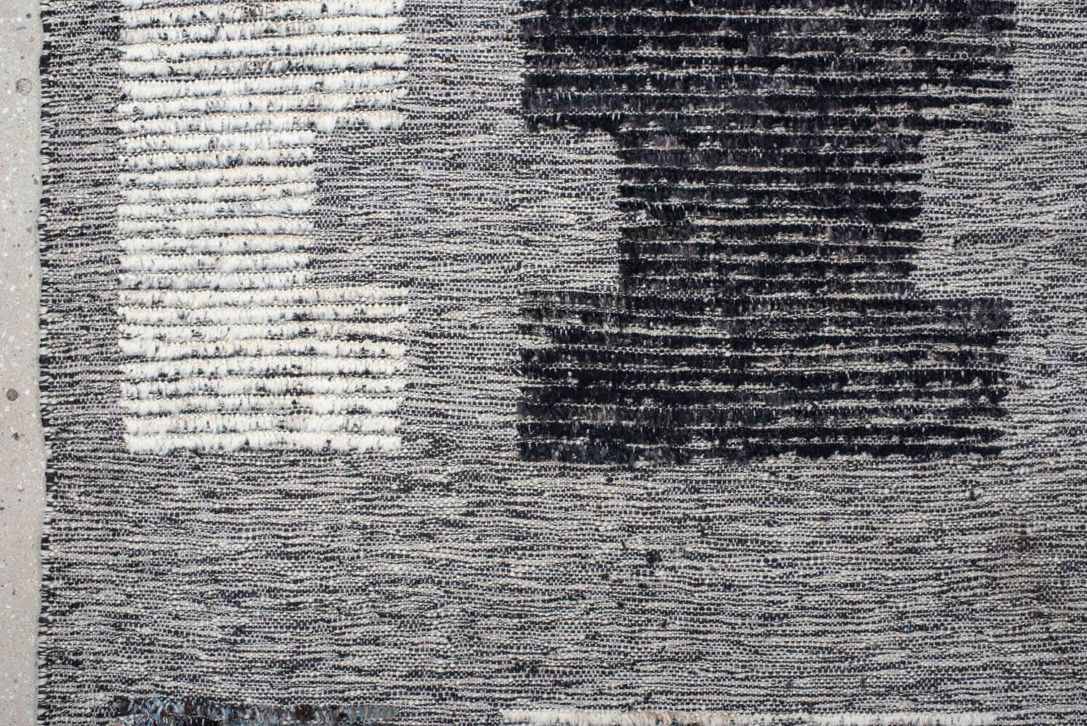 7' x 9' one-of-a-kind handmade vintage Tulu rug. Color palette: gray, charcoal, ivory, turquoise, taupe, black, teal, beige