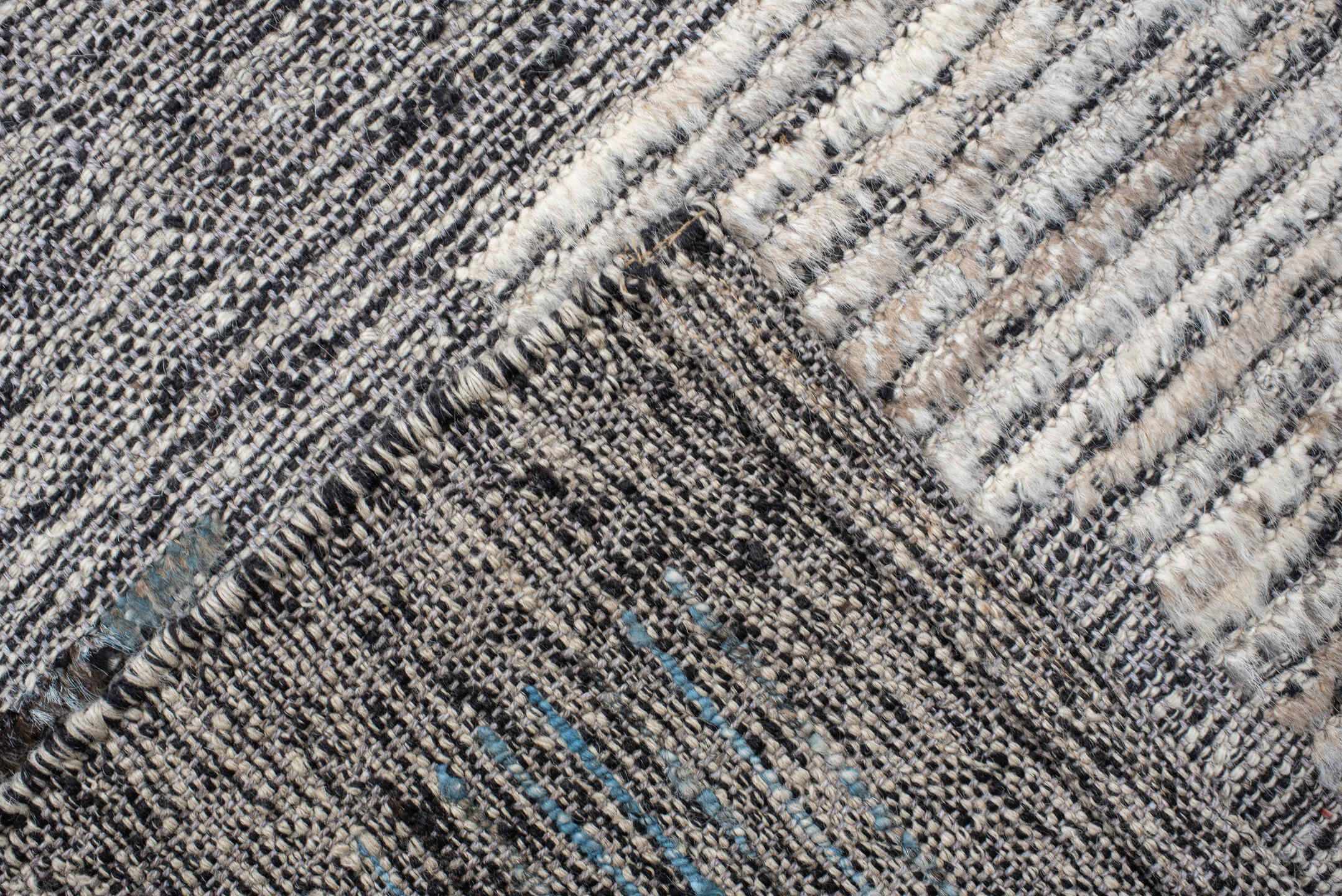 7' x 9' one-of-a-kind handmade vintage Tulu rug. Color palette: gray, charcoal, ivory, turquoise, taupe, black, teal, beige