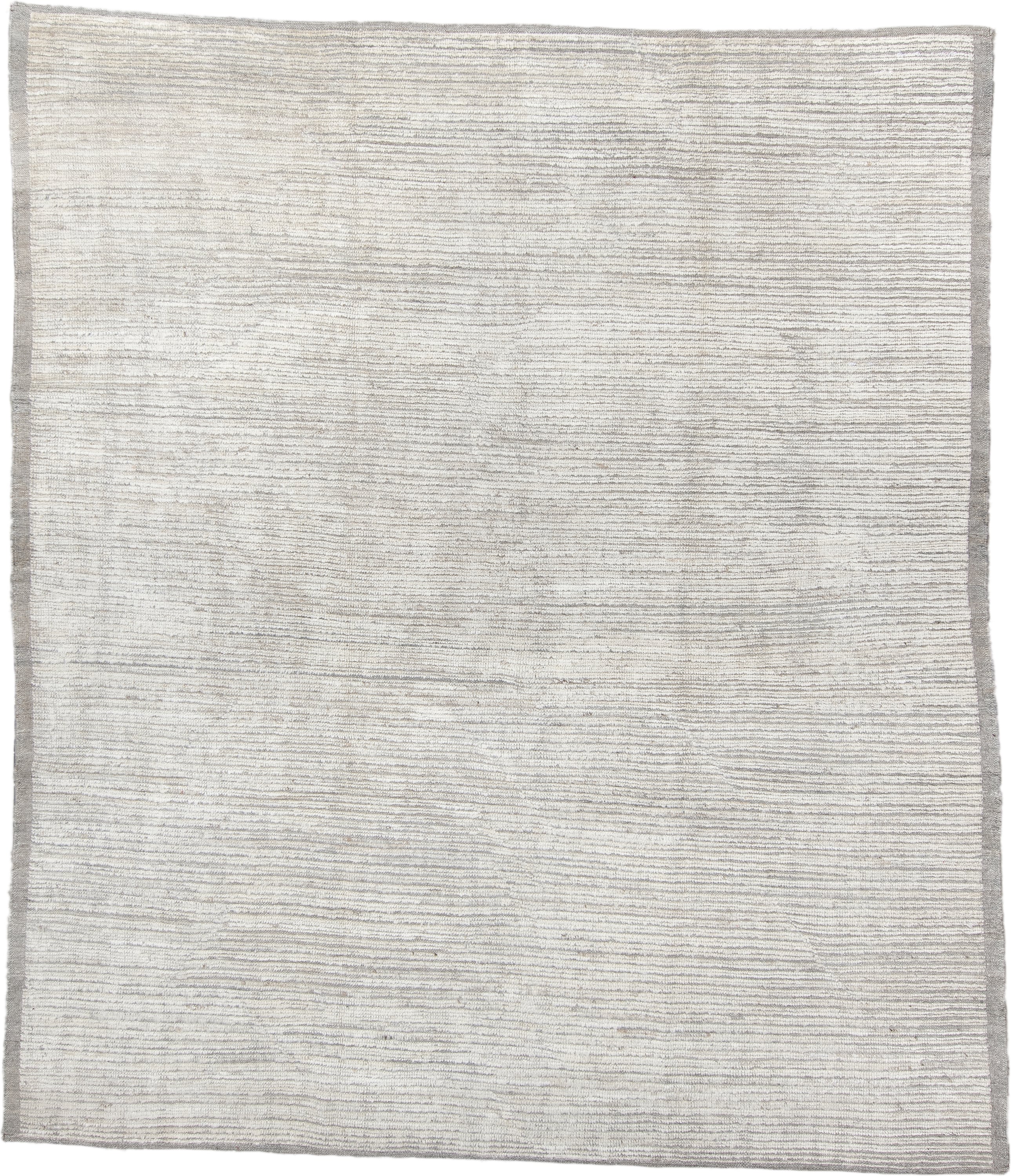 8' x 9' one-of-a-kind handmade vintage Tulu rug. Color palette: ivory, gray, cream, taupe, beige