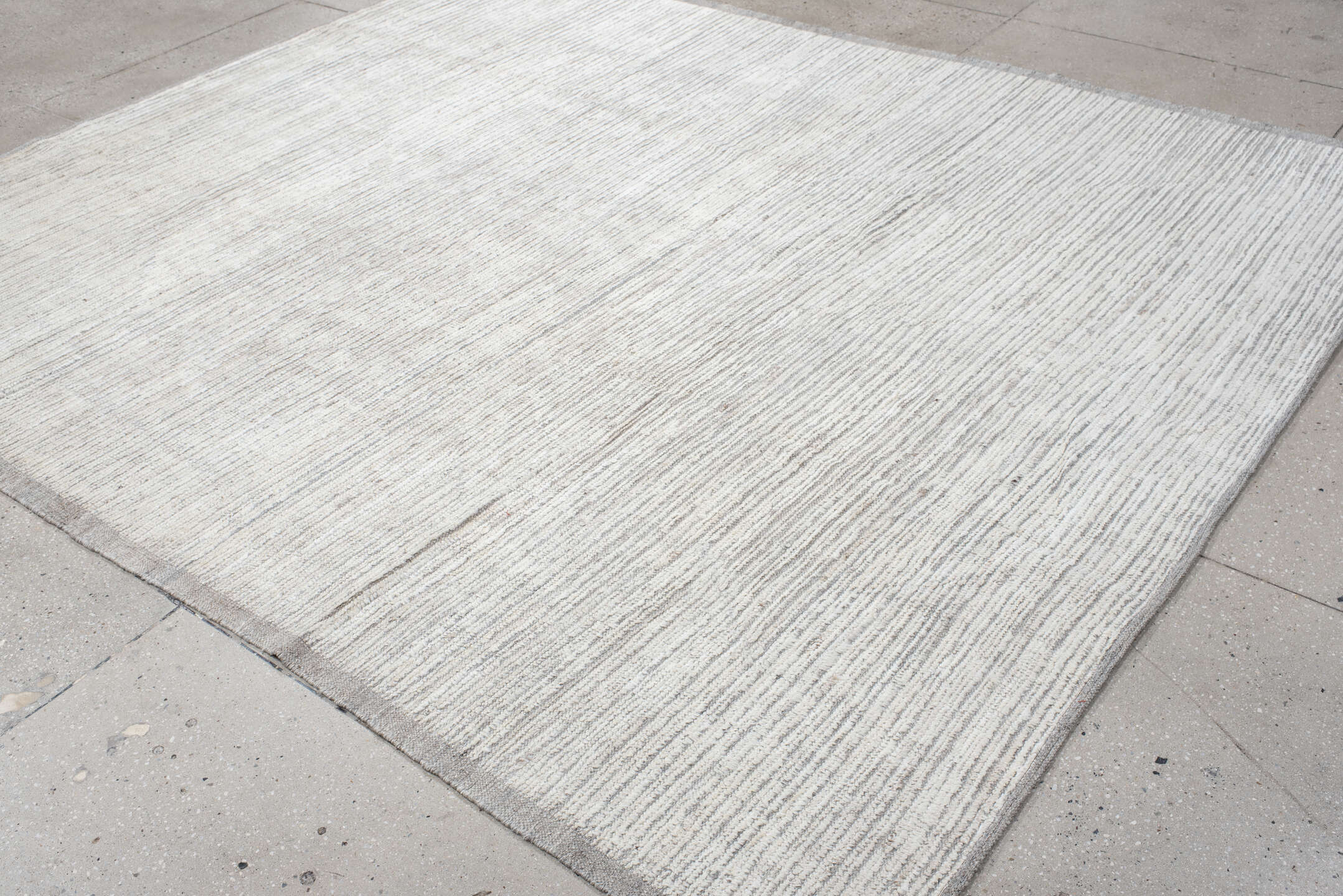 8' x 9' one-of-a-kind handmade vintage Tulu rug. Color palette: gray, light gray, off-white, silver, gainsboro, dark gray