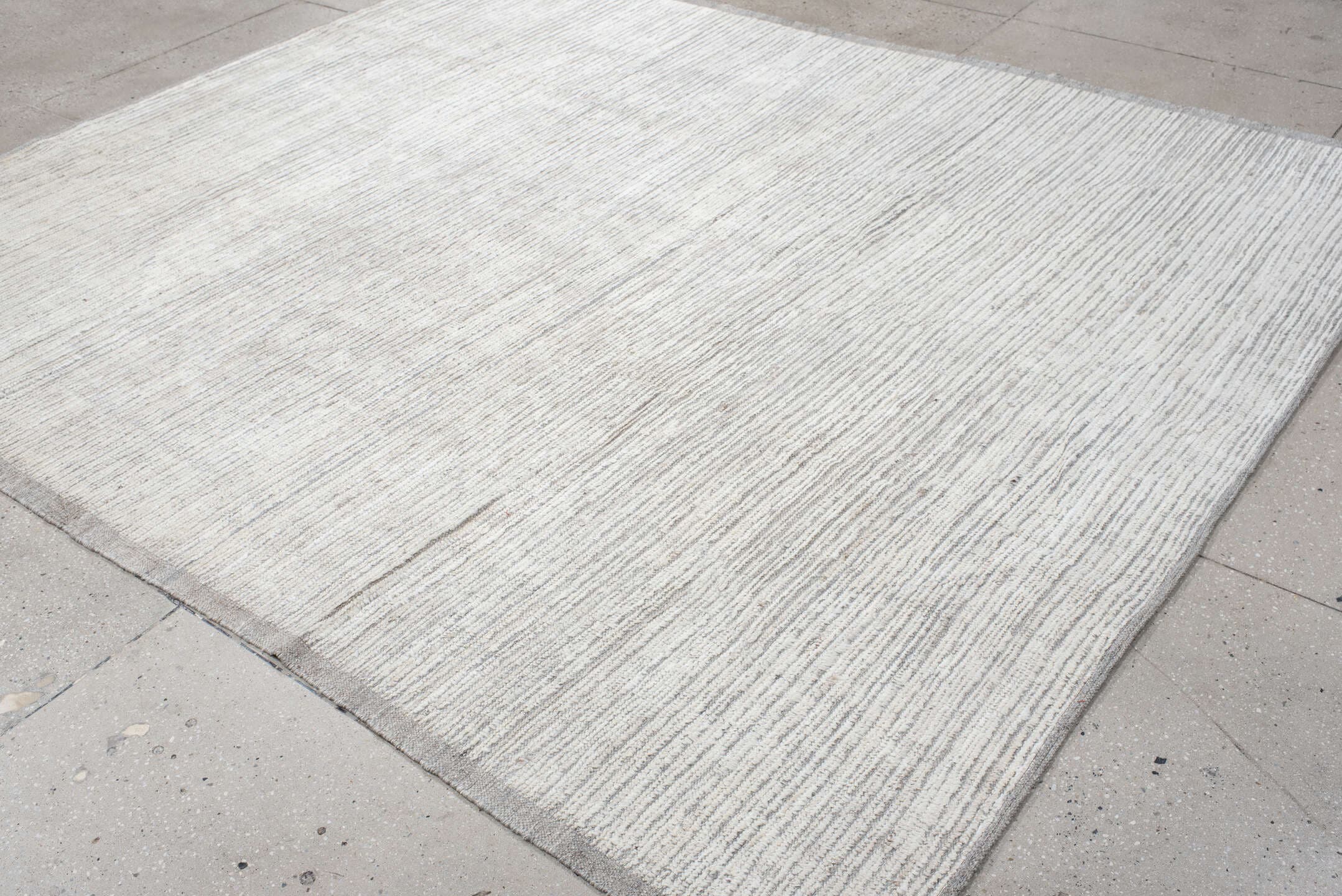 8' x 9' one-of-a-kind handmade vintage Tulu rug. Color palette: ivory, gray, cream, taupe, beige