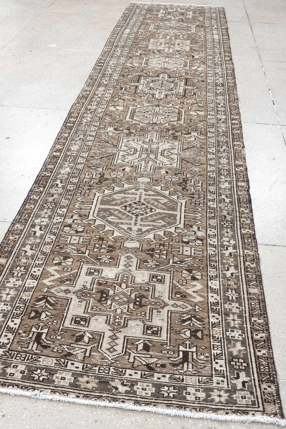 2' x 12' one-of-a-kind handmade antique Karaje runner rug. Color palette: taupe, ivory, brown, gray, charcoal, beige, black
