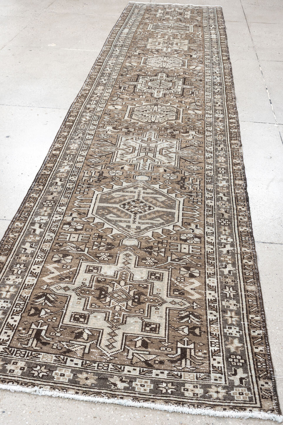 2' x 12' one-of-a-kind handmade antique Karaje runner rug. Color palette: taupe, ivory, brown, gray, charcoal, beige, black