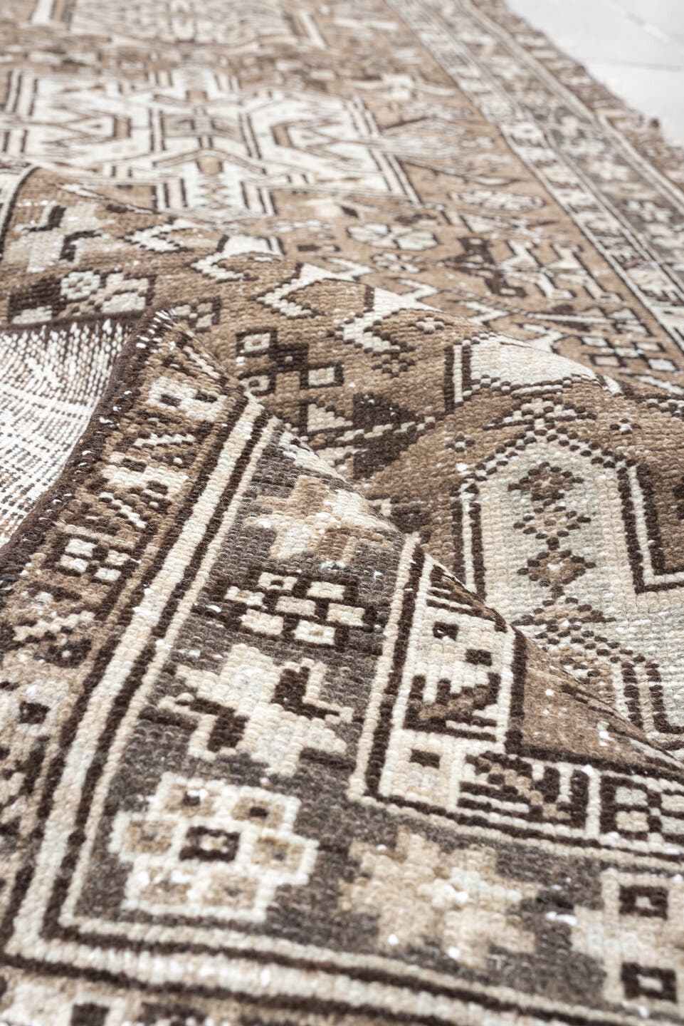 2' x 12' one-of-a-kind handmade antique Karaje runner rug. Color palette: taupe, ivory, brown, gray, charcoal, beige, black