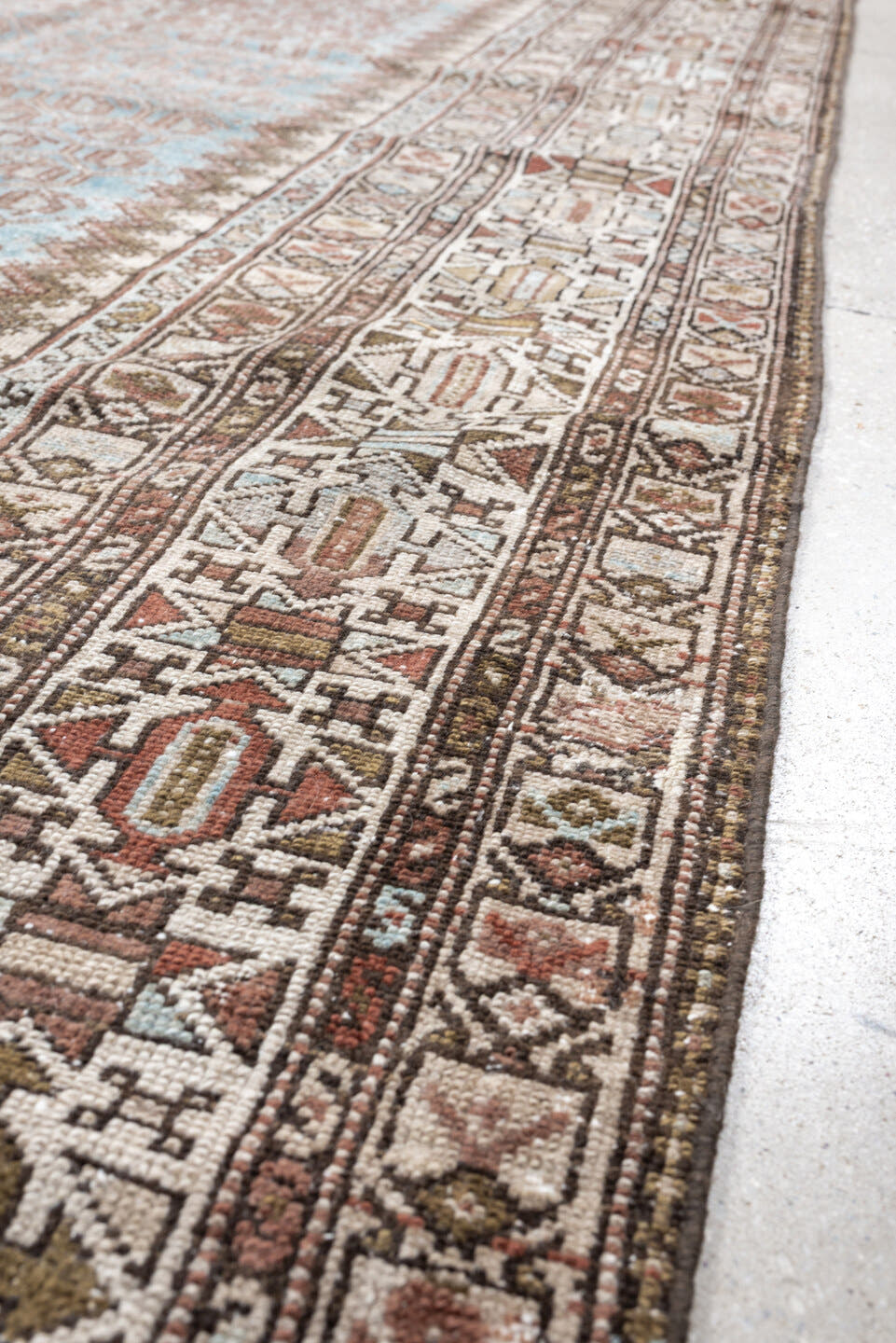 4' x 9' one-of-a-kind handmade antique Malayer runner rug. Color palette: ivory, sky blue, taupe, rust, brown, camel
