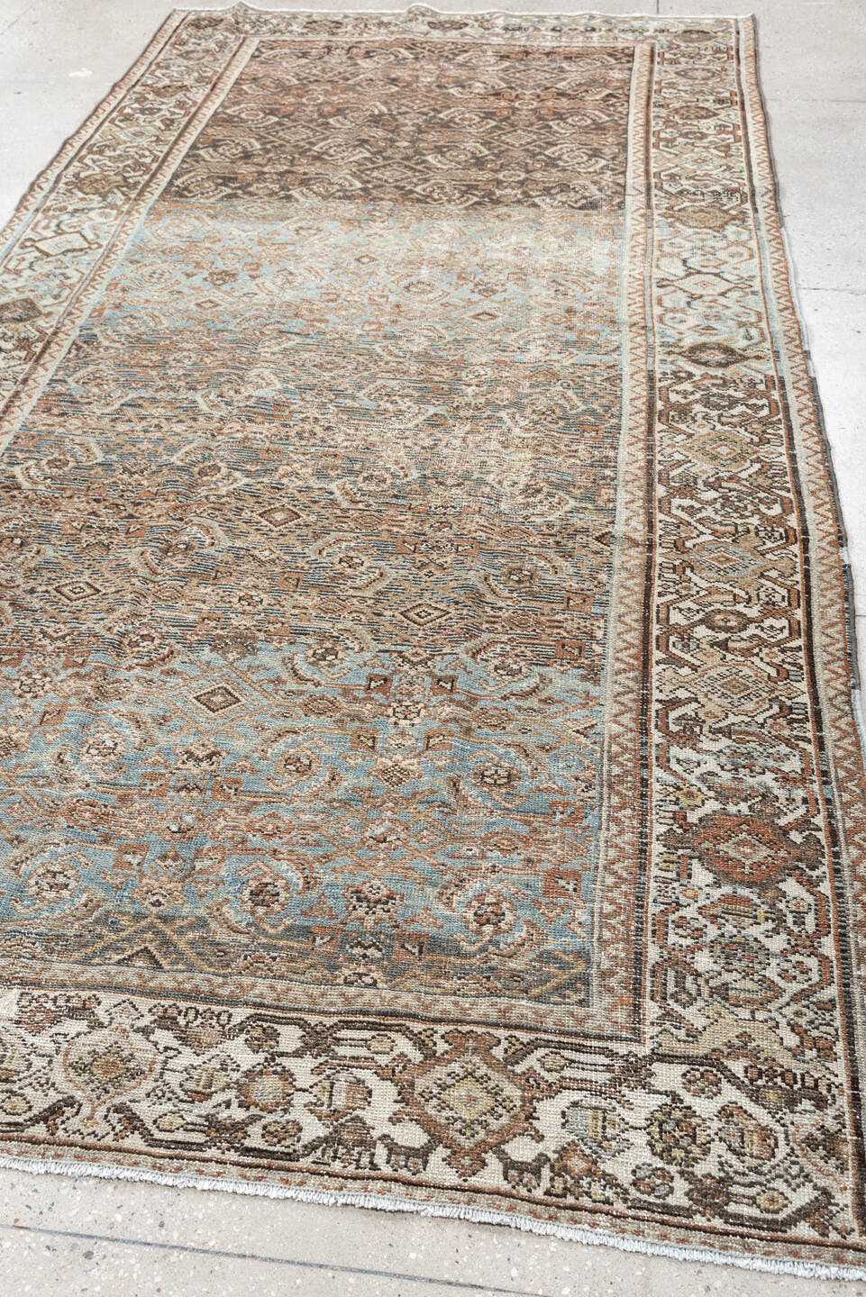 5' x 10' one-of-a-kind handmade vintage Malayer rug. Color palette: ivory, sky blue, taupe, brown, camel, slate, rust