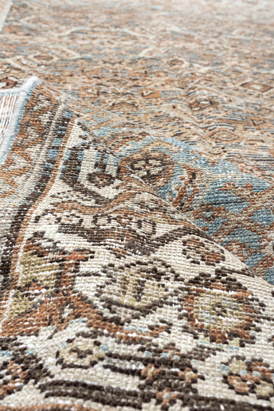 5' x 10' one-of-a-kind handmade vintage Malayer rug. Color palette: ivory, sky blue, taupe, brown, camel, slate, rust