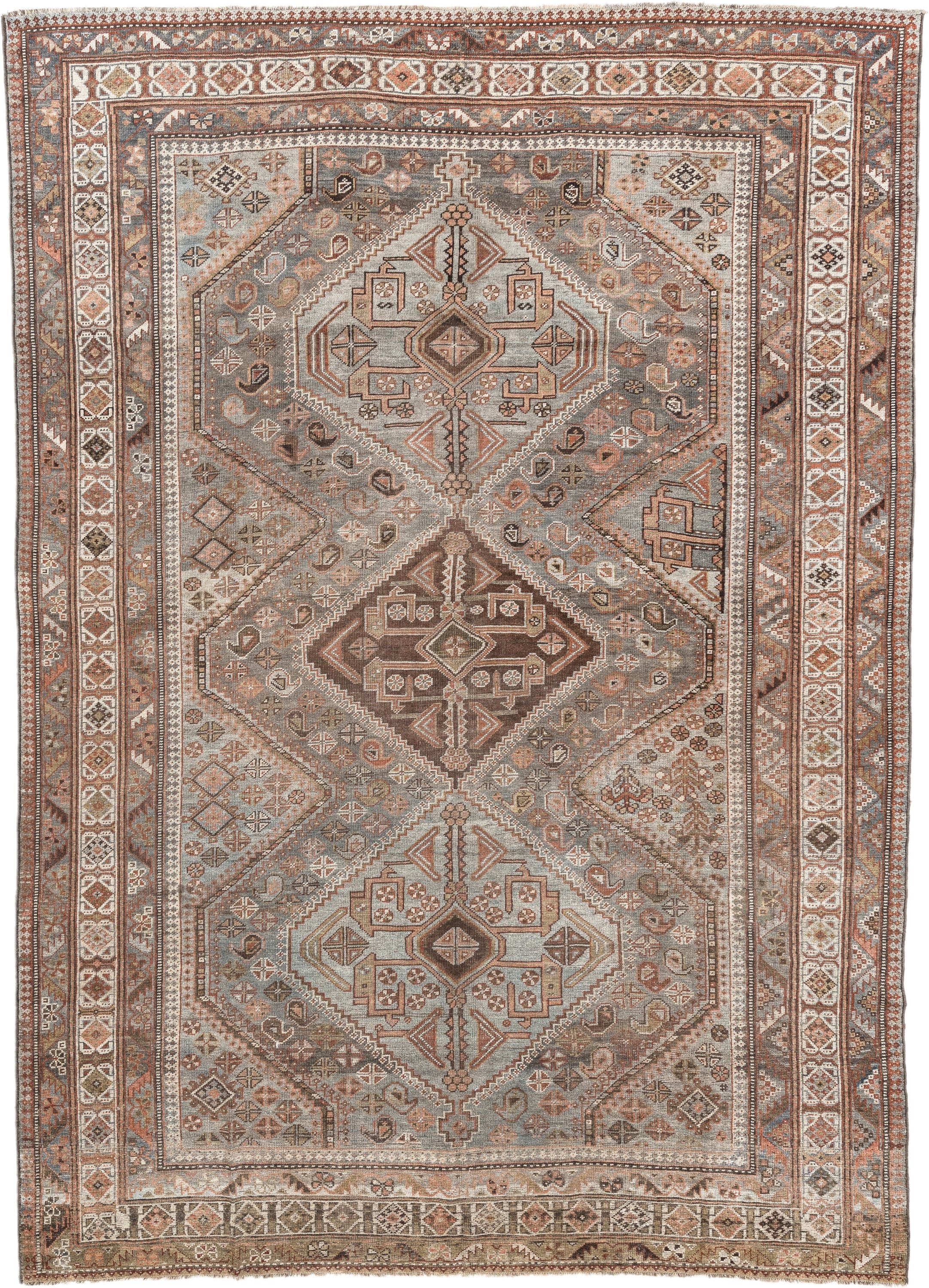 6' x 9' one-of-a-kind handmade antique Qashqai rug. Color palette: taupe, ivory, rust, slate, brown, camel, charcoal, beige