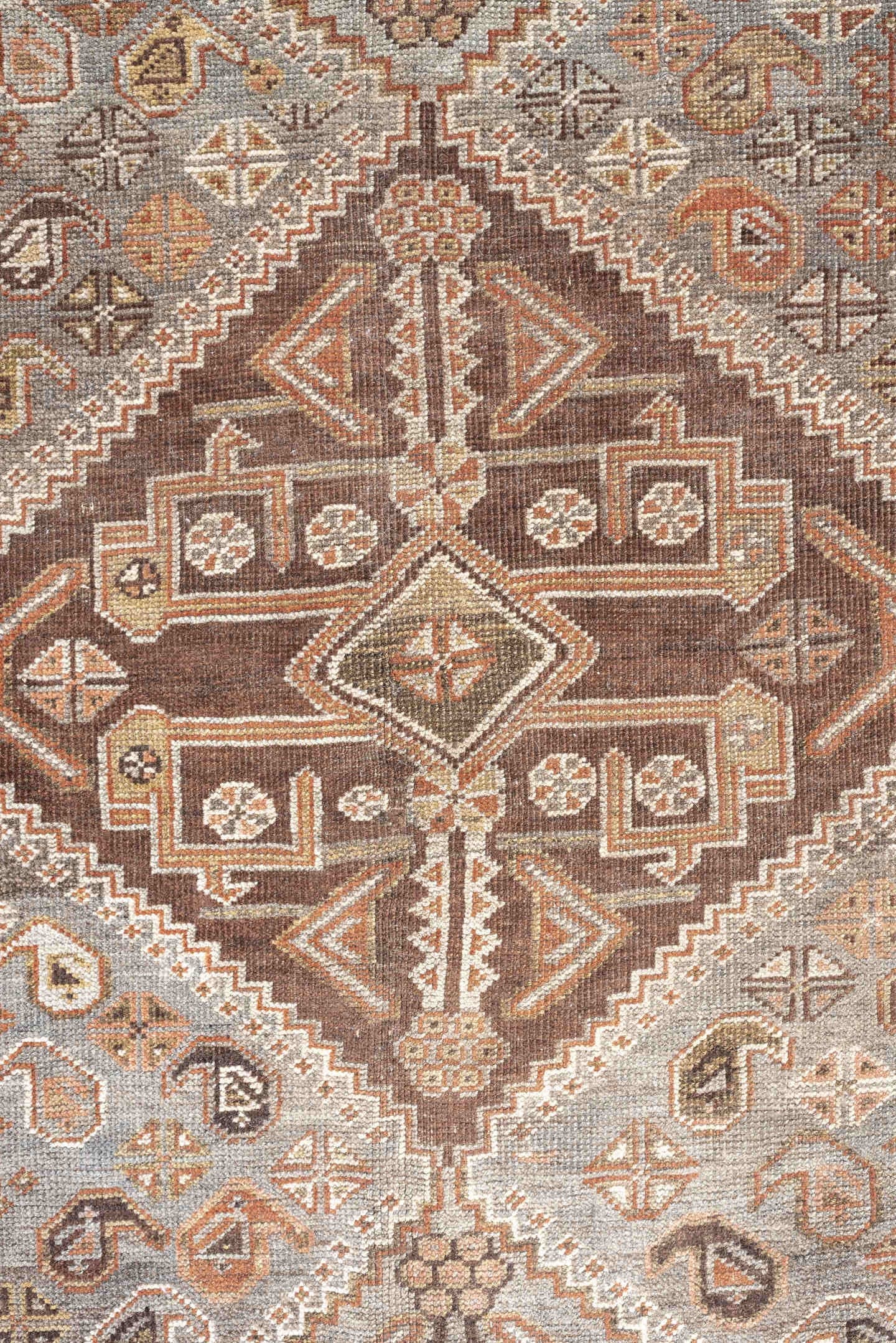 6' x 9' one-of-a-kind handmade antique Qashqai rug. Color palette: taupe, ivory, rust, slate, brown, camel, charcoal, beige