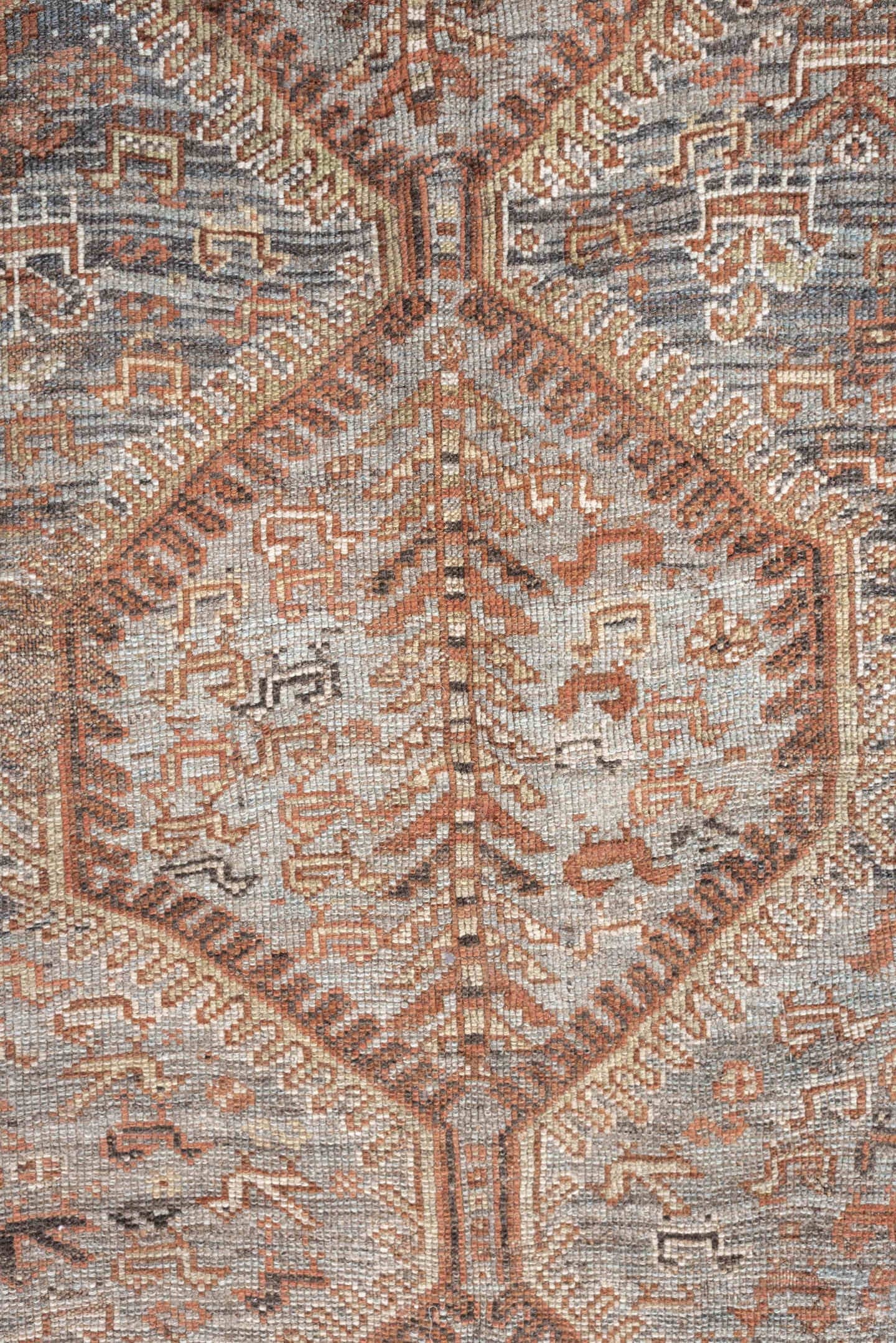 6' x 8' one-of-a-kind handmade antique Shiraz medium size rug. Color palette: blue, rust, ivory, taupe, slate, camel