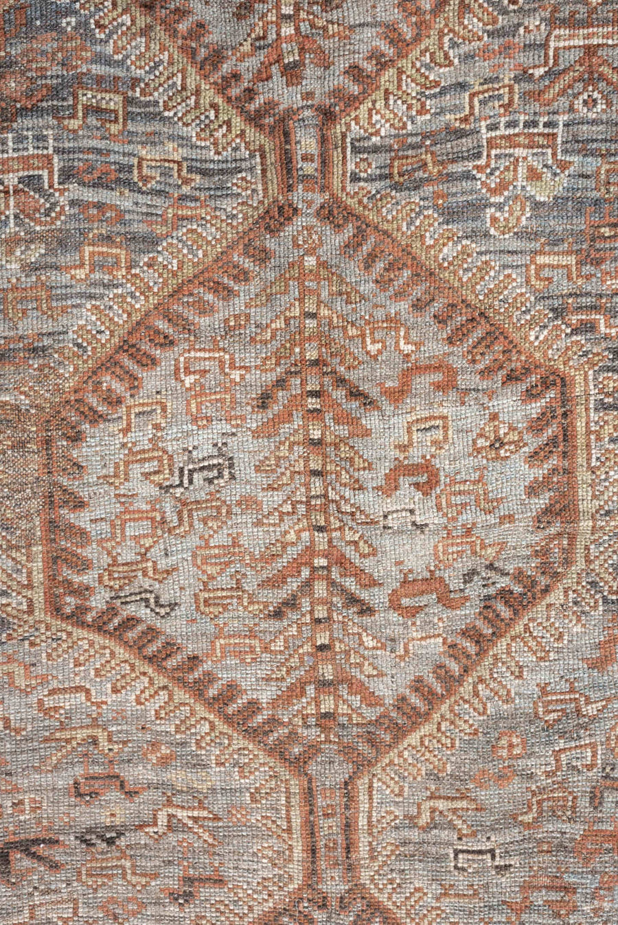 6' x 8' one-of-a-kind handmade antique Shiraz medium size rug. Color palette: blue, rust, ivory, taupe, slate, camel