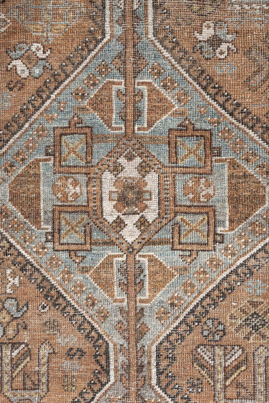 7' x 10' one-of-a-kind handmade antique Shiraz large size rug. Color palette: terra cotta, sky blue, ivory, taupe, brown