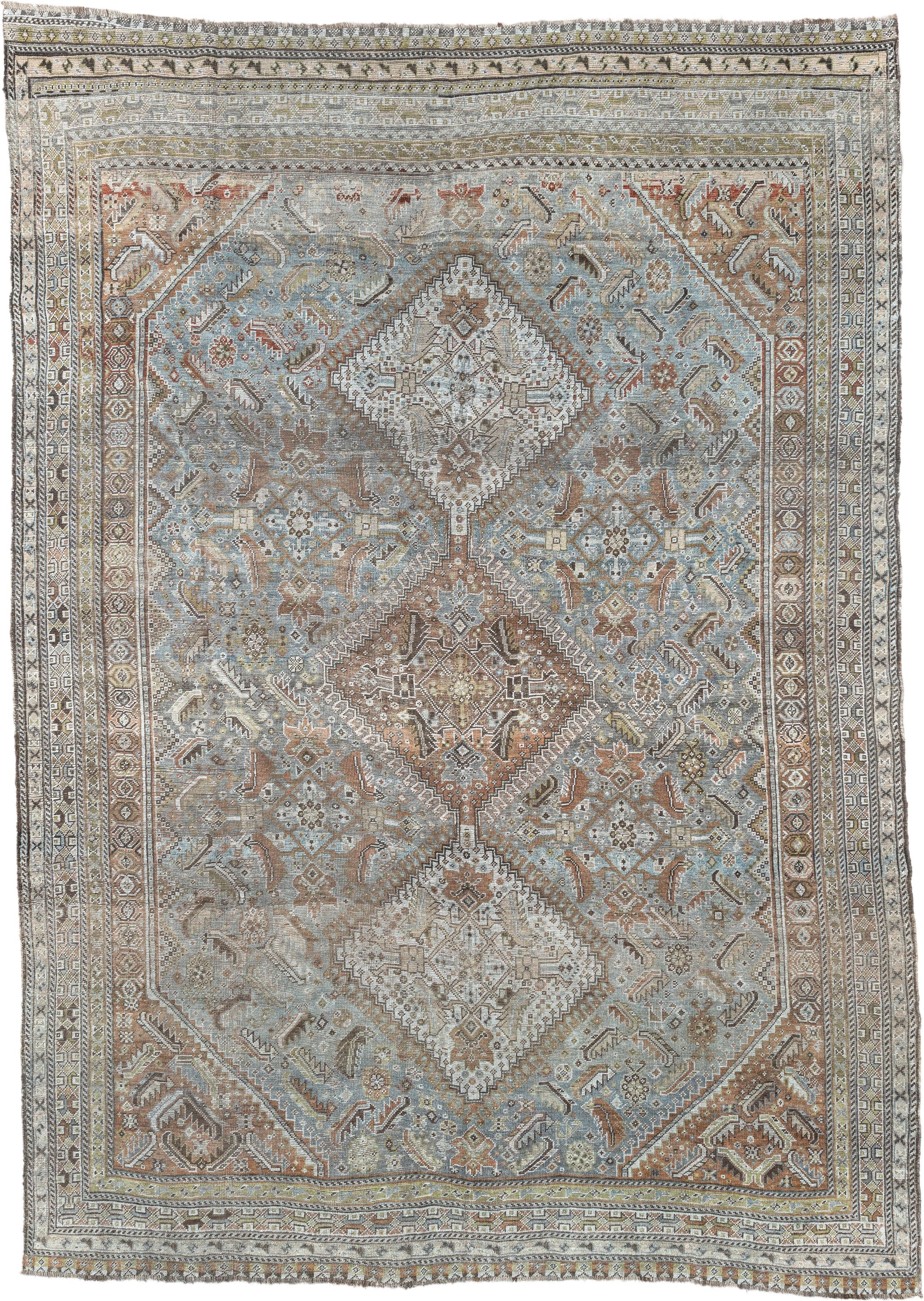 6' x 9' one-of-a-kind handmade antique Shiraz rug. Color palette: light blue, ivory, taupe, rust, brown, gold, camel