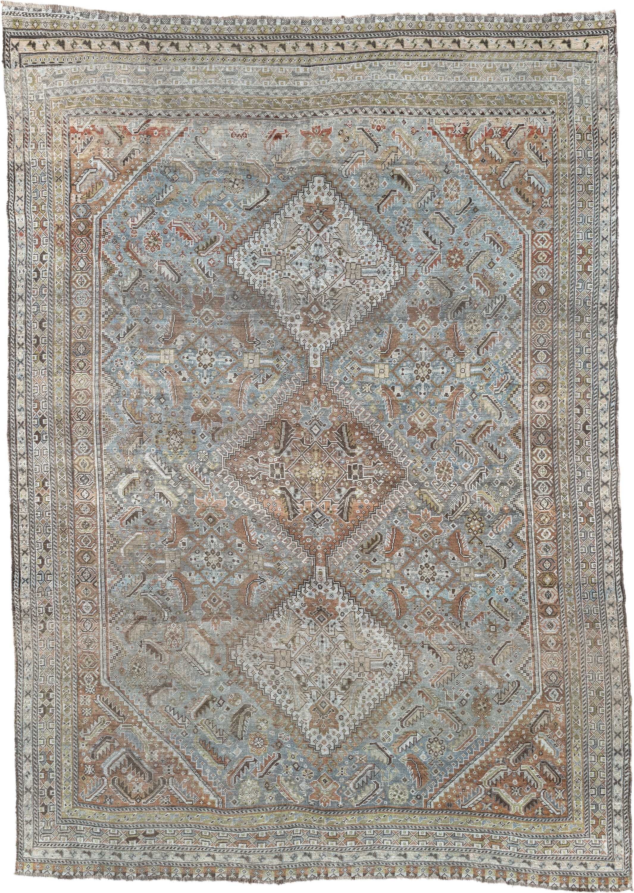 6' x 9' one-of-a-kind handmade antique Shiraz rug. Color palette: light blue, ivory, taupe, rust, brown, gold, camel
