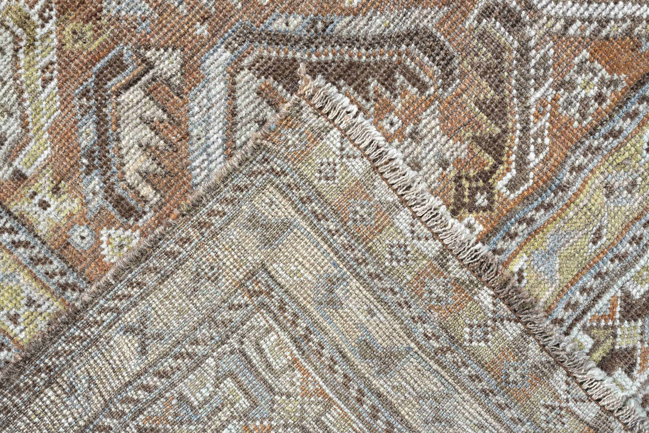 6' x 9' one-of-a-kind handmade antique Shiraz rug. Color palette: light blue, ivory, taupe, rust, brown, gold, camel
