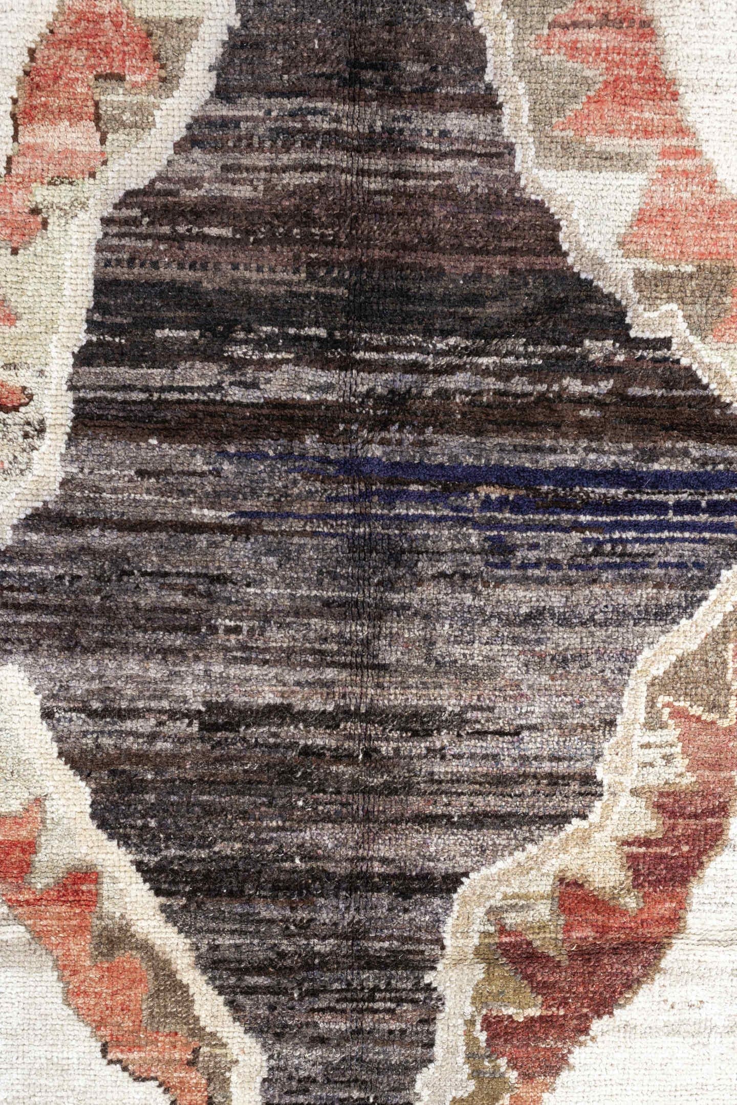 8' x 9' one-of-a-kind handmade antique Kars rug. Color palette: brown, ivory, taupe, charcoal, camel, coral, slate, cream