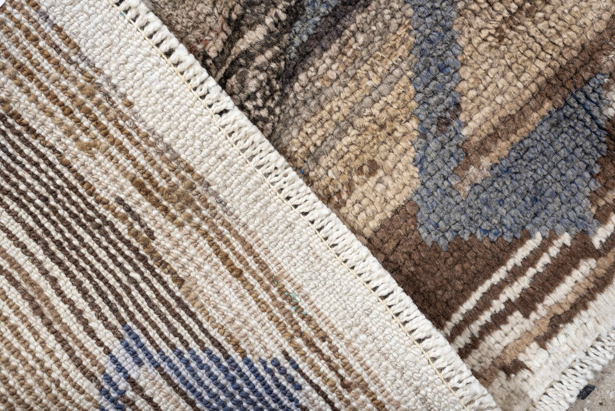 8' x 9' one-of-a-kind handmade antique Kars rug. Color palette: brown, ivory, taupe, charcoal, camel, coral, slate, cream