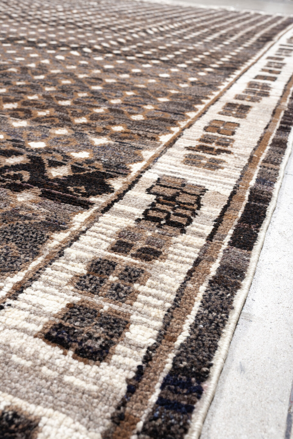10' x 14' one-of-a-kind handmade vintage Kars oversize rug. Color palette: charcoal, ivory, taupe, brown, camel, gray, black