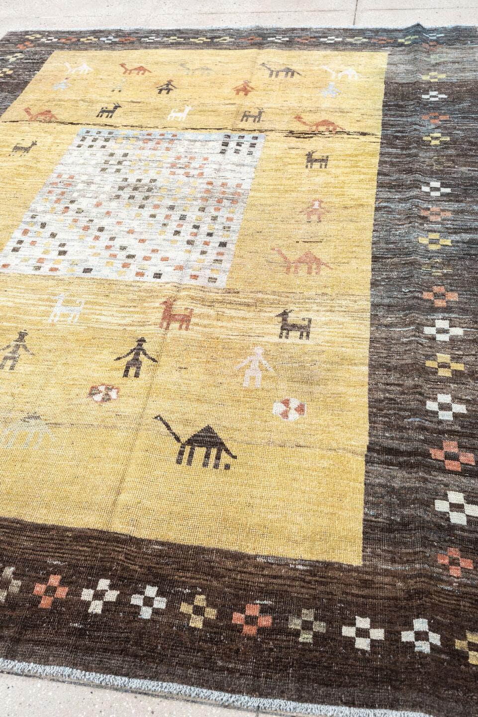 6' x 8' one-of-a-kind handmade antique Gabbe rug. Color palette: gold, charcoal, ivory, camel, coral, slate, sage, rose