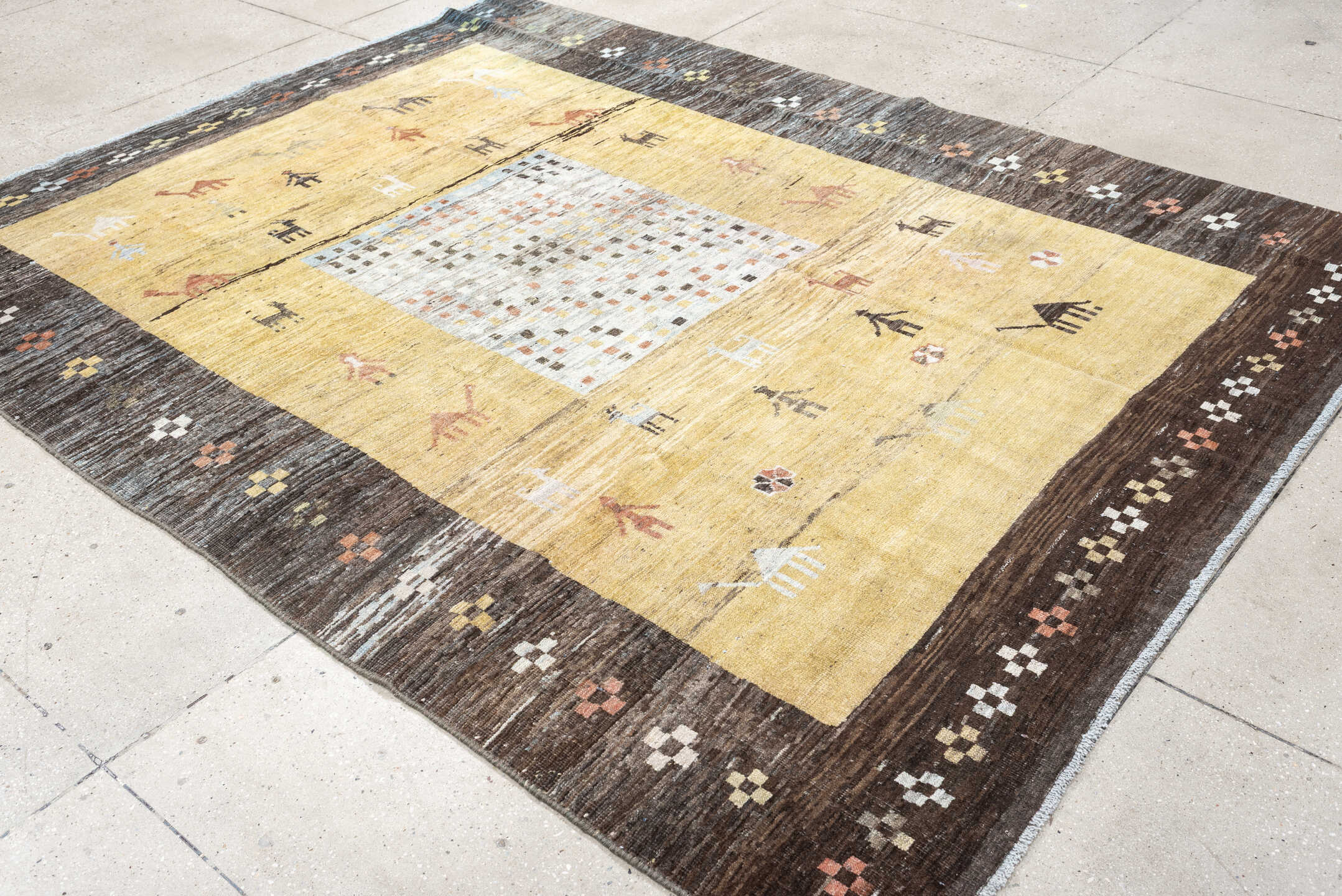 6' x 8' one-of-a-kind handmade antique Gabbe rug. Color palette: gold, charcoal, ivory, camel, coral, slate, sage, rose